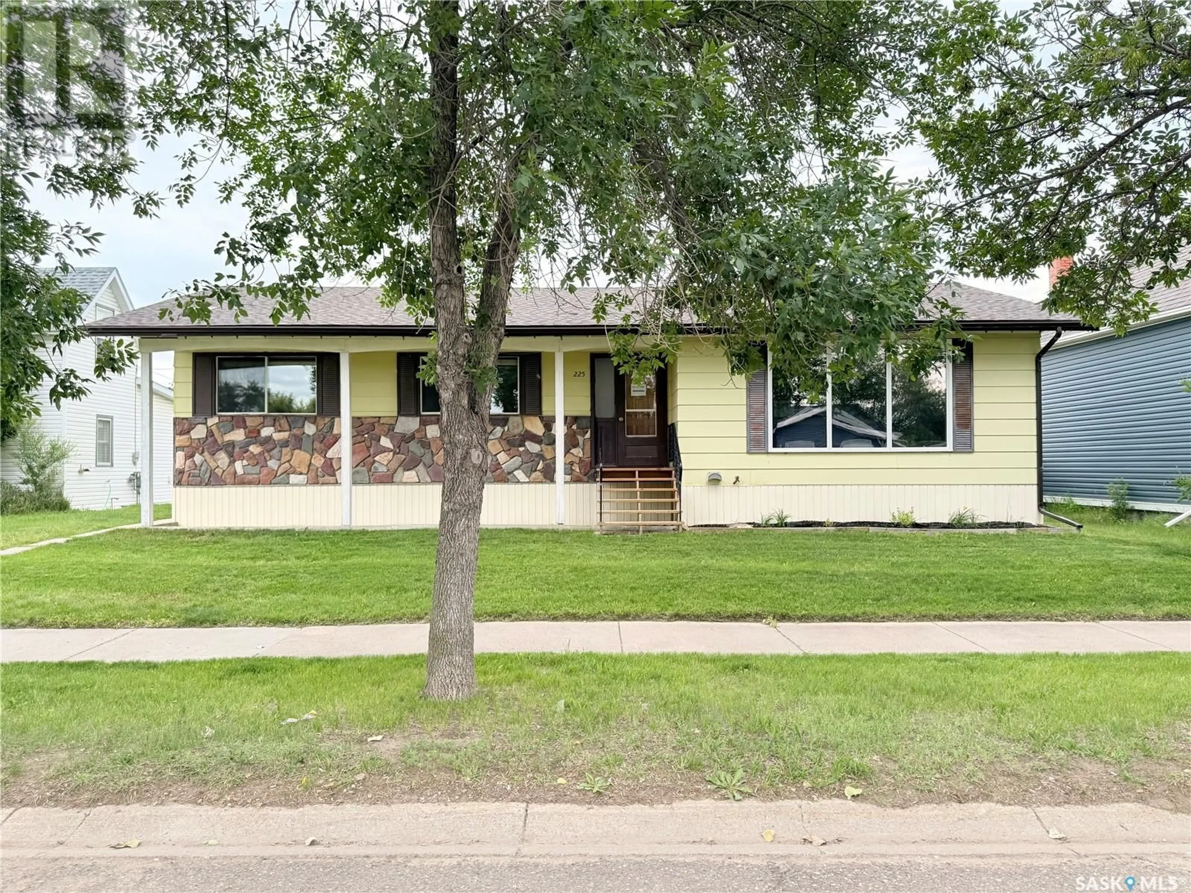 Home with vinyl exterior material, street for 223 DOUGLASS STREET, Outlook Saskatchewan S0L2N0