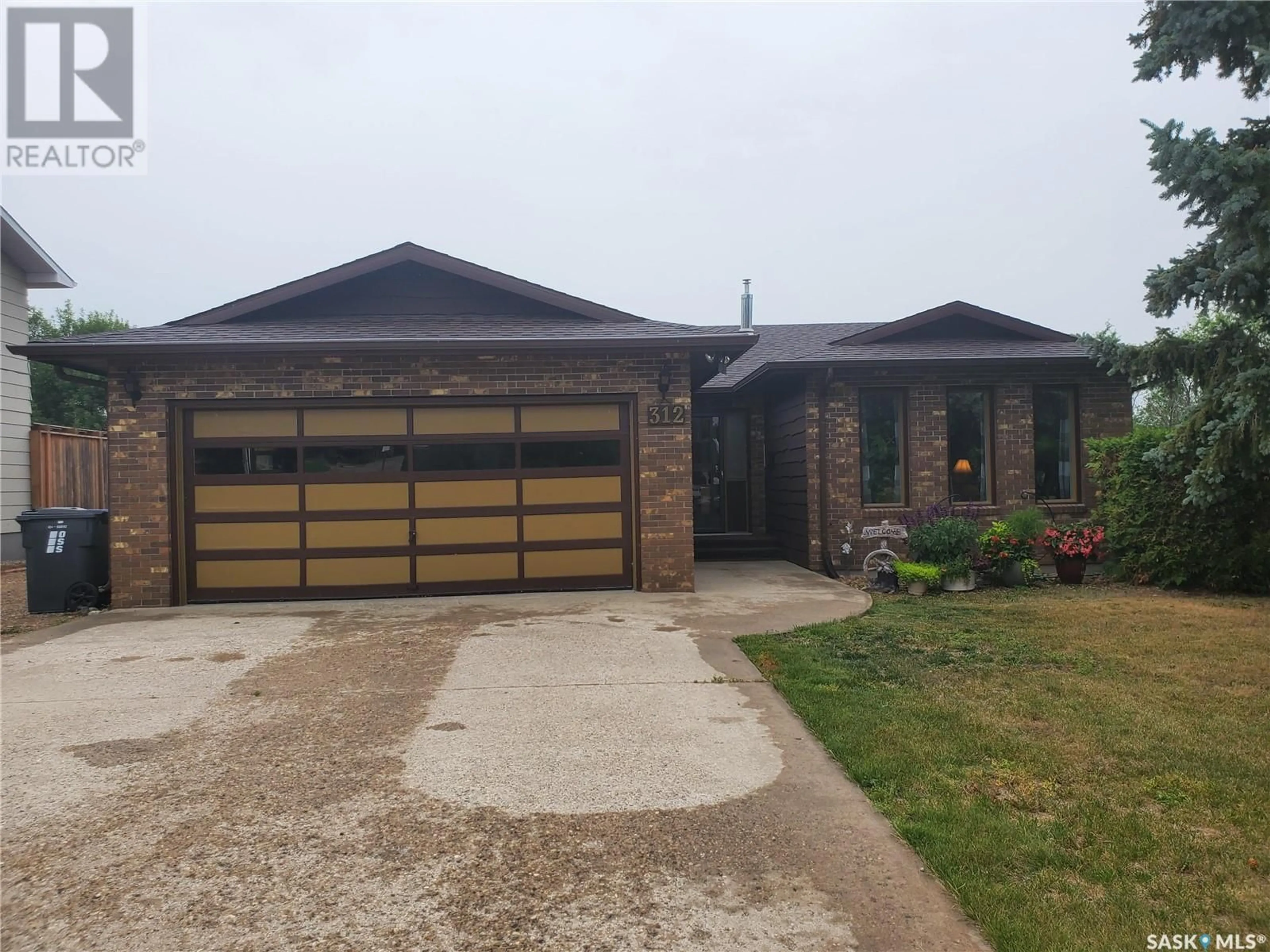 Home with brick exterior material, street for 312 STEWART STREET, Kamsack Saskatchewan S0A1S0
