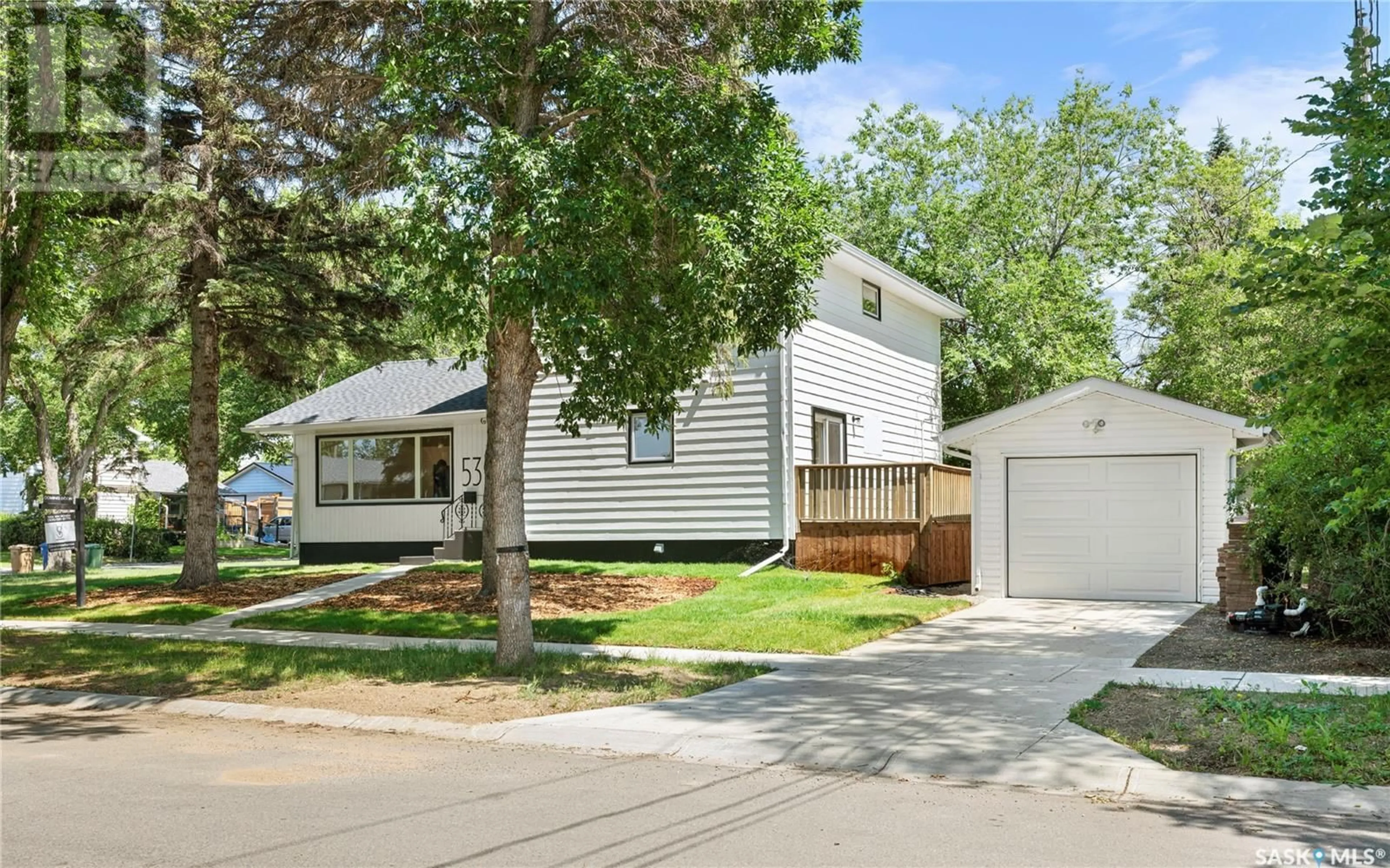 Home with vinyl exterior material, street for 53 LANGLEY STREET, Regina Saskatchewan S4S3V5