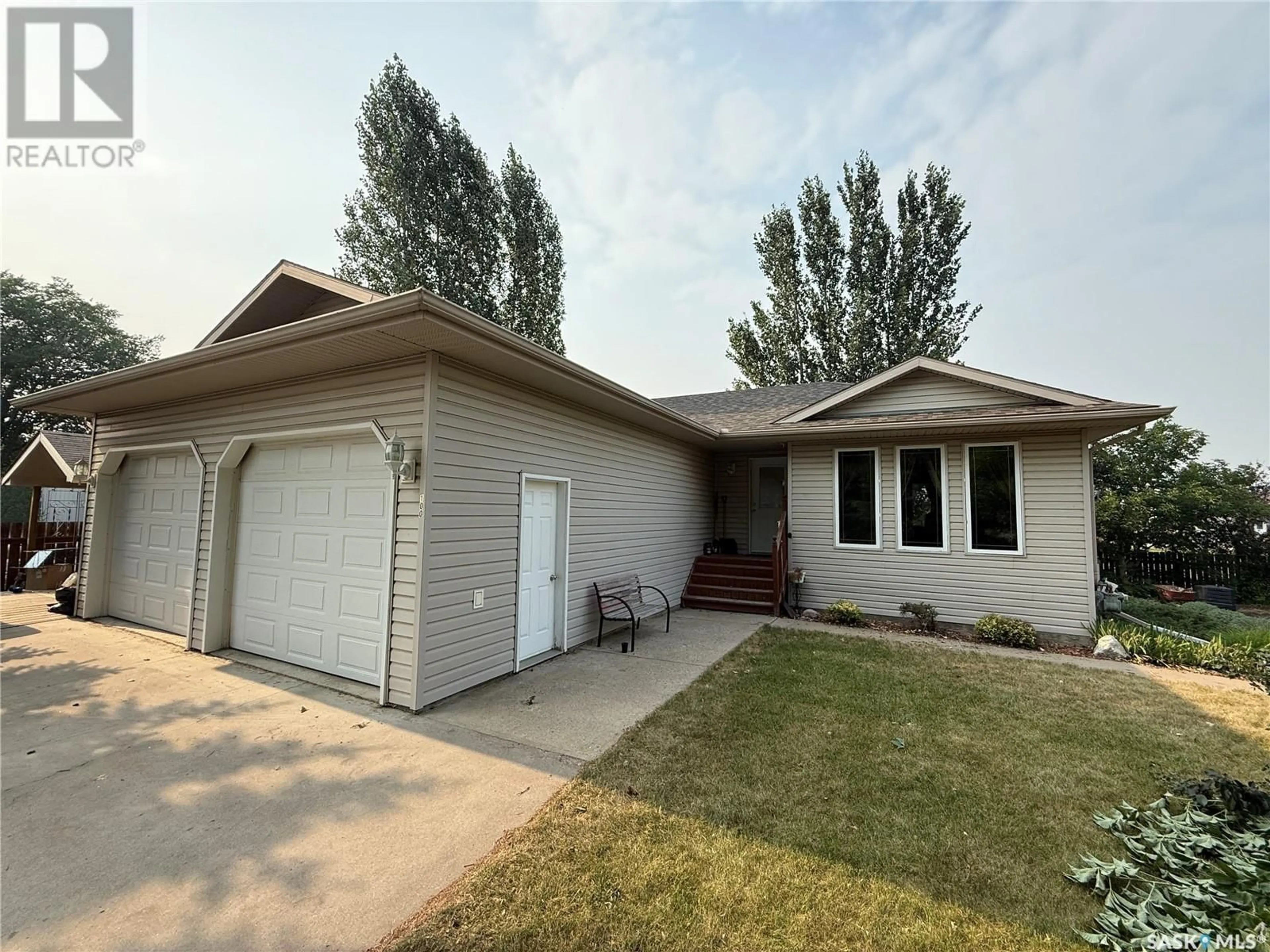 Home with vinyl exterior material, street for 100 6TH AVENUE, Shellbrook Saskatchewan S0J2E0