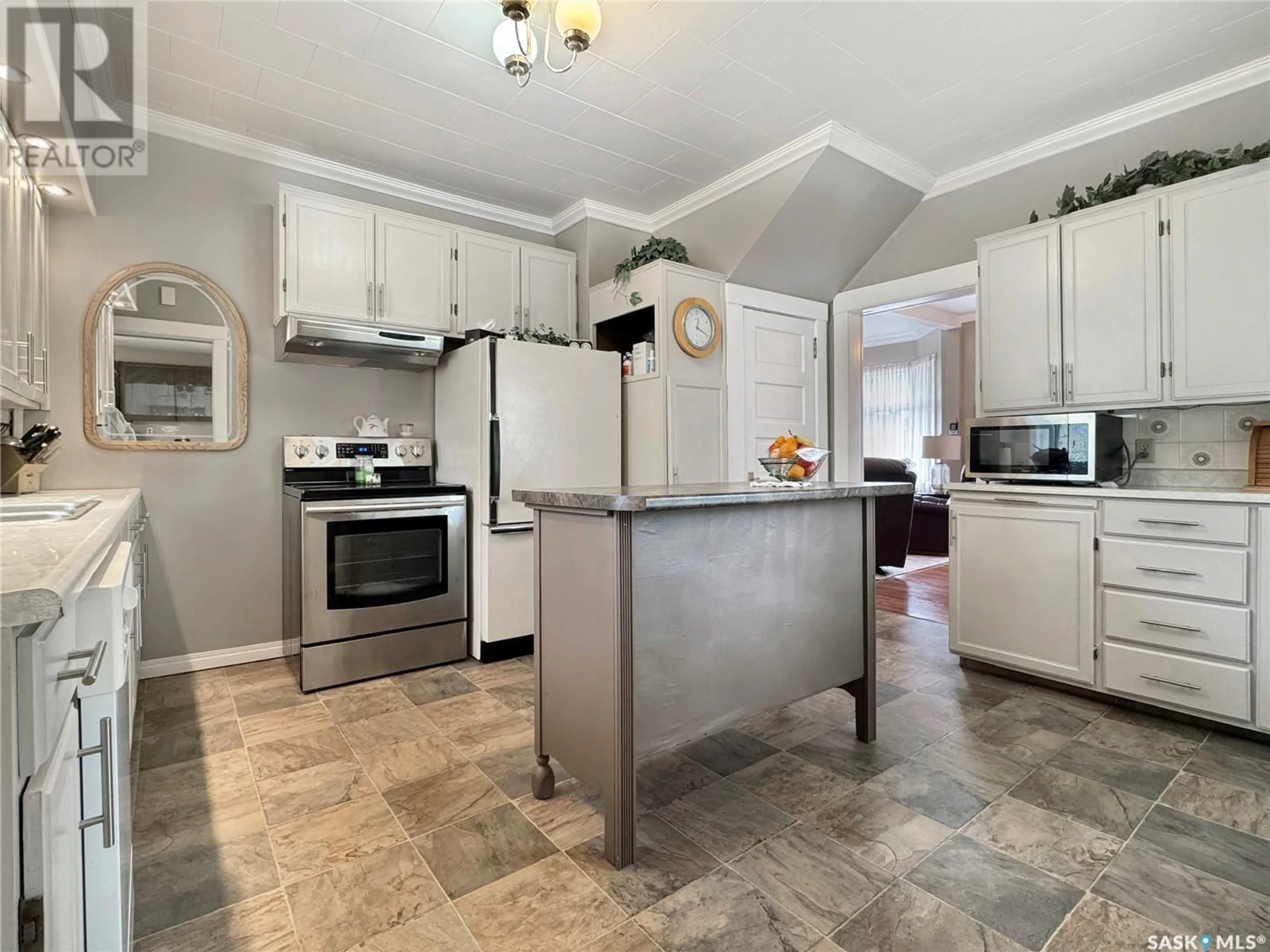 Open concept kitchen, ceramic/tile floor for 301 ARTHUR STREET, Cut Knife Saskatchewan S0M0N0