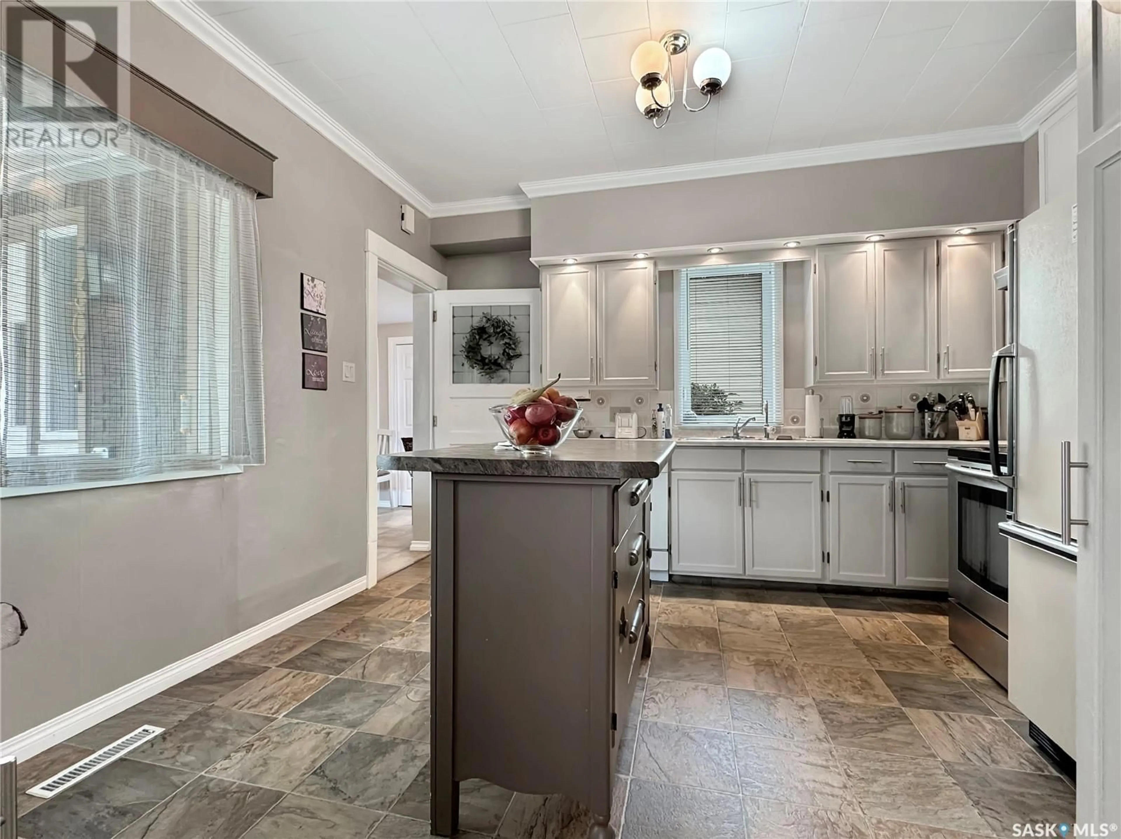 Open concept kitchen, ceramic/tile floor for 301 ARTHUR STREET, Cut Knife Saskatchewan S0M0N0