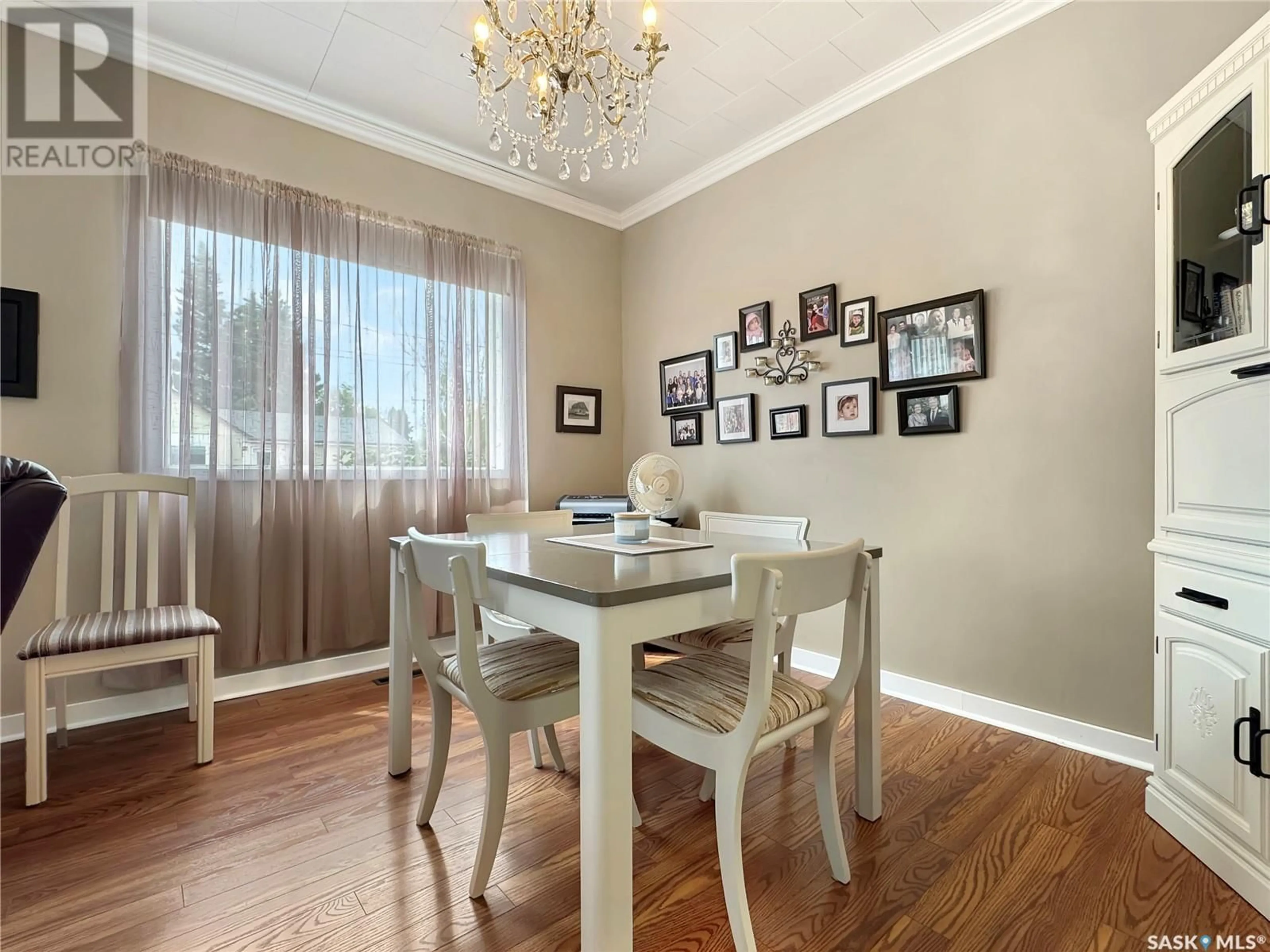 Dining room, wood/laminate floor for 301 ARTHUR STREET, Cut Knife Saskatchewan S0M0N0