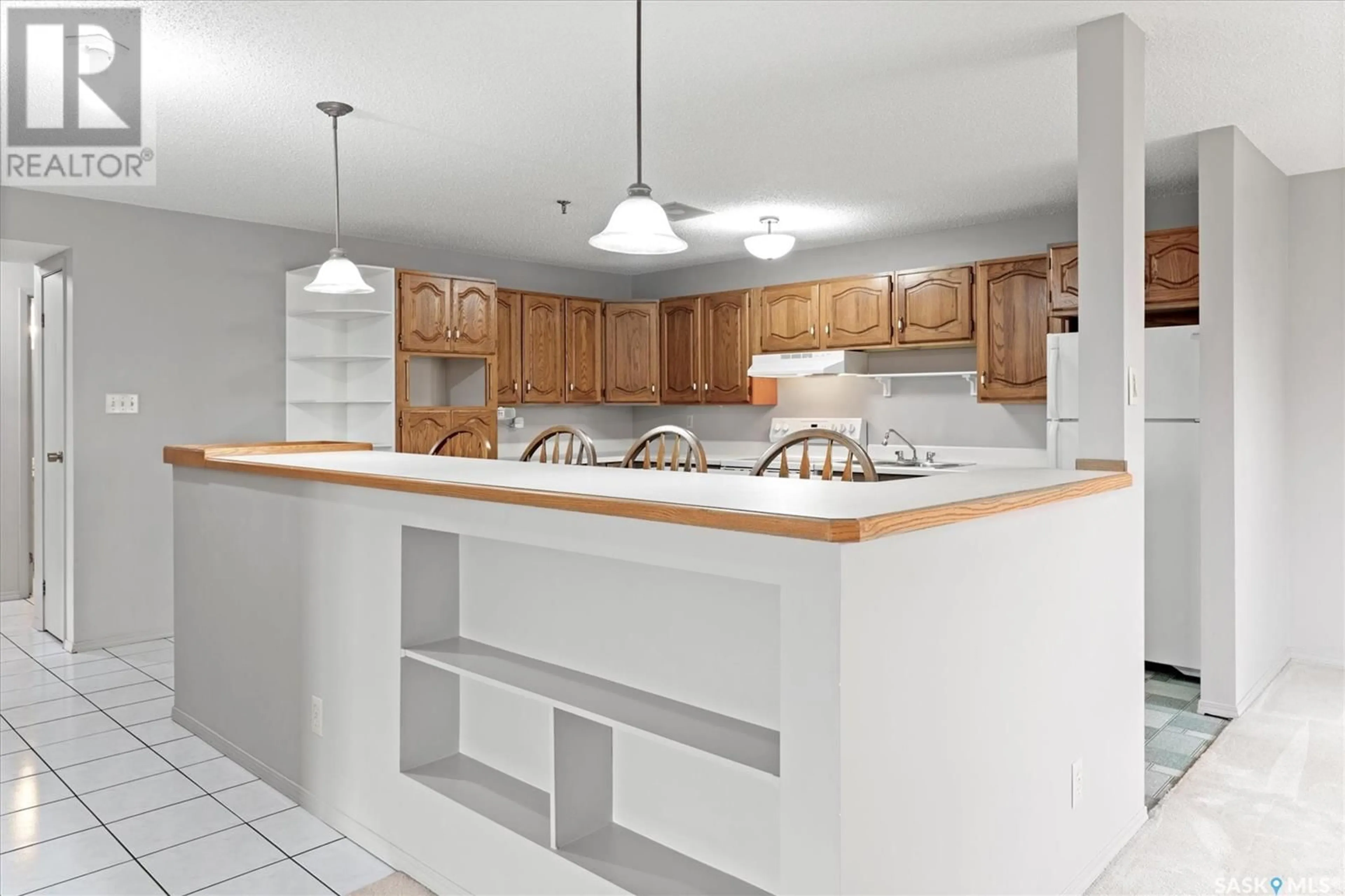 Open concept kitchen, ceramic/tile floor for 510 - 704 5TH AVENUE N, Saskatoon Saskatchewan S7K2R2
