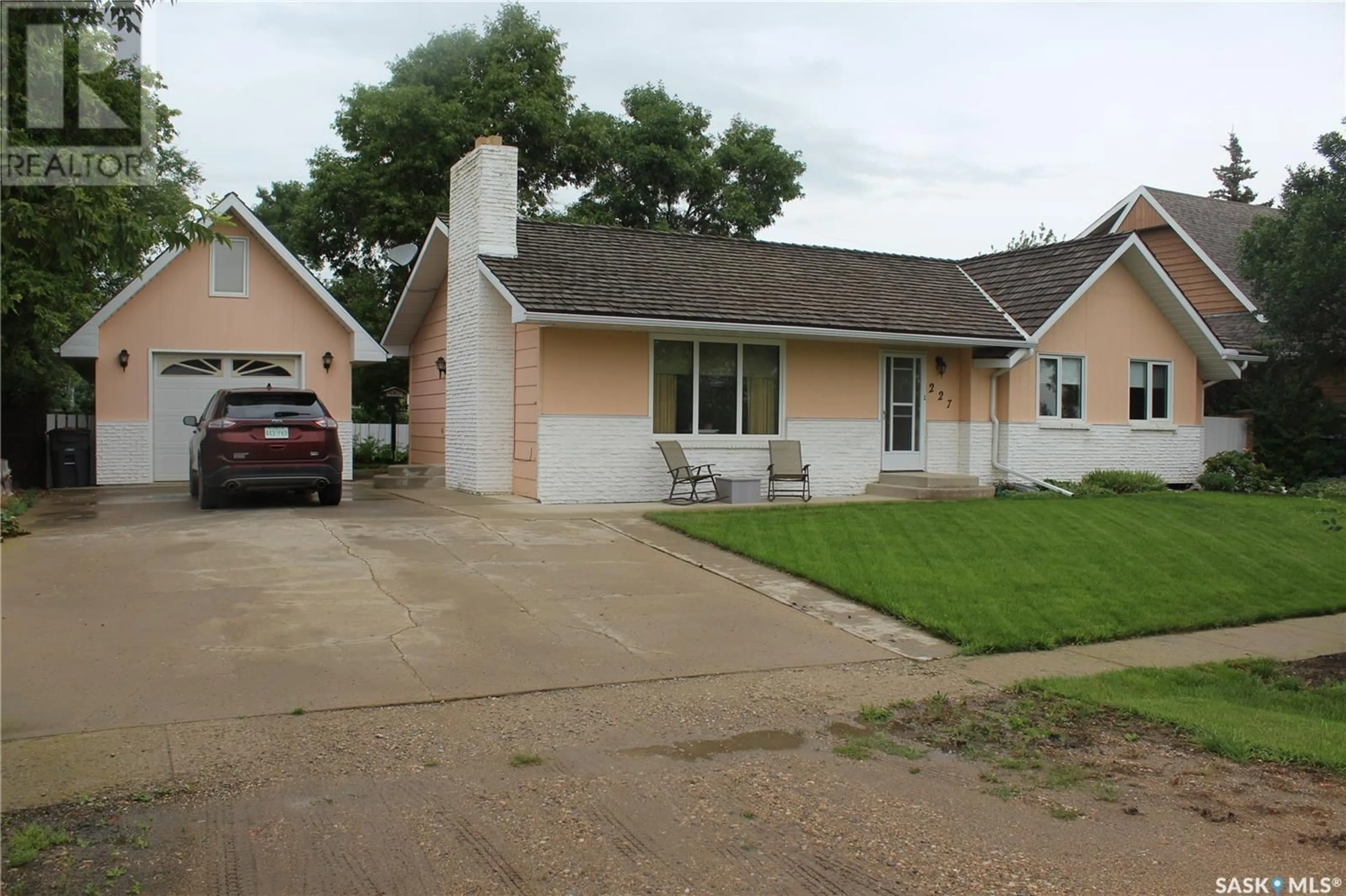 Home with vinyl exterior material, street for 227 KING STREET, Milestone Saskatchewan S0G3L0