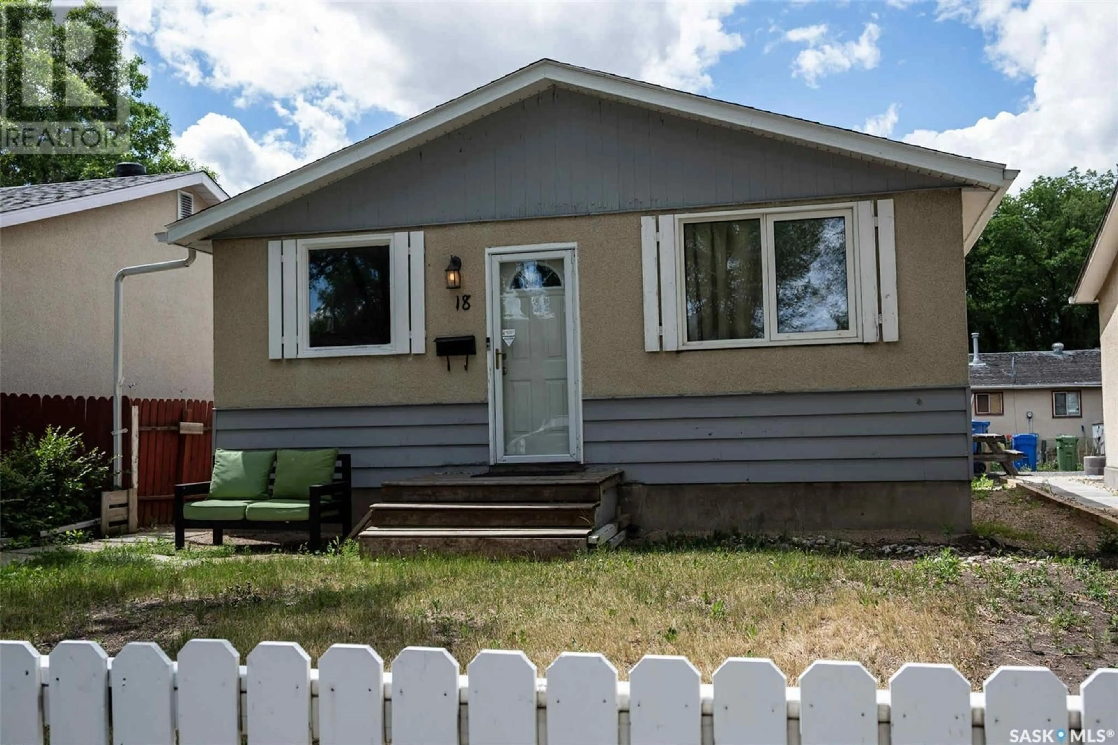 Home with vinyl exterior material, street for 18 MARSHALL CRESCENT, Regina Saskatchewan S4R4Y7