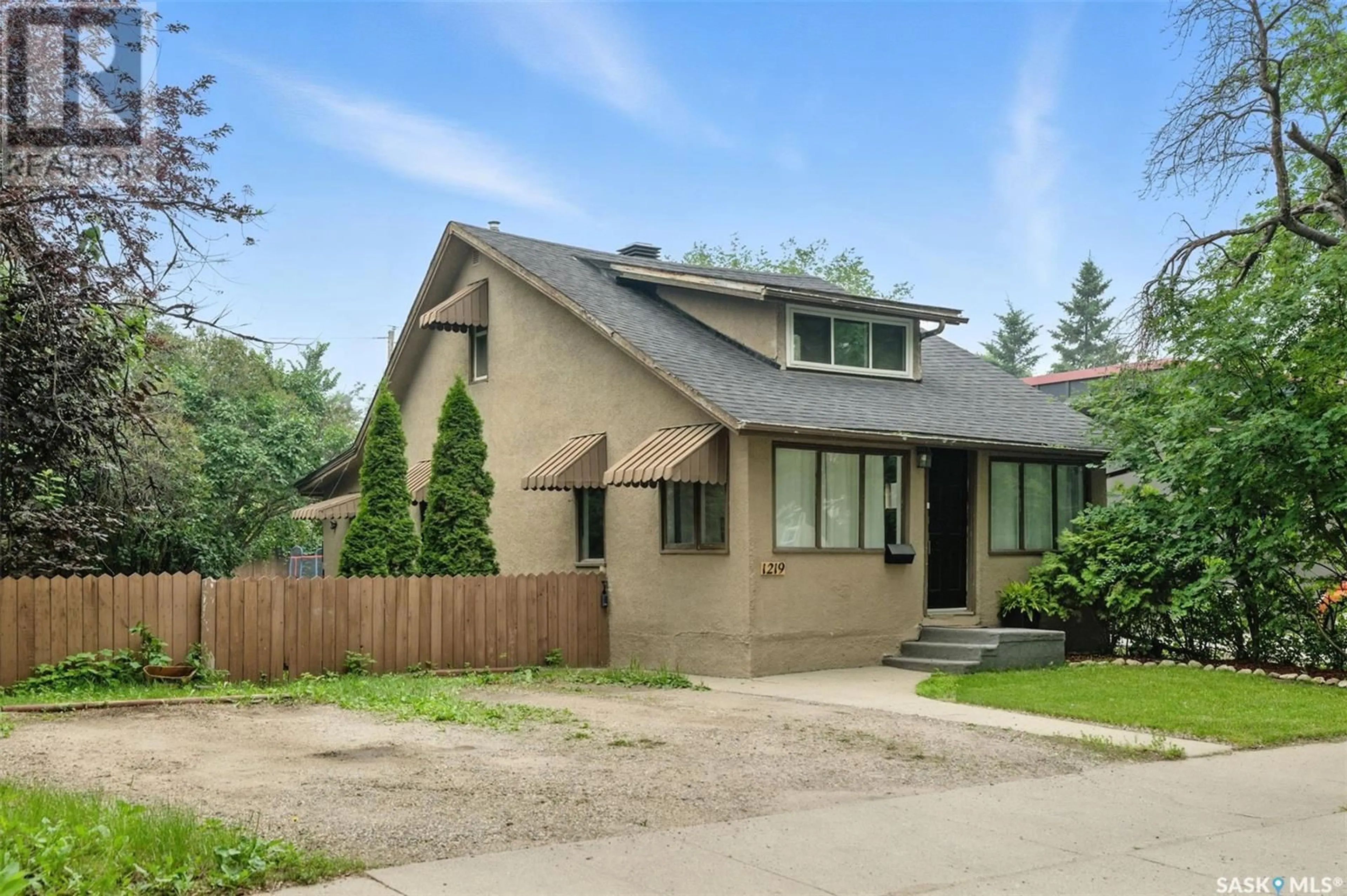 Home with brick exterior material, street for 1219 B AVENUE, Saskatoon Saskatchewan S7L1G4