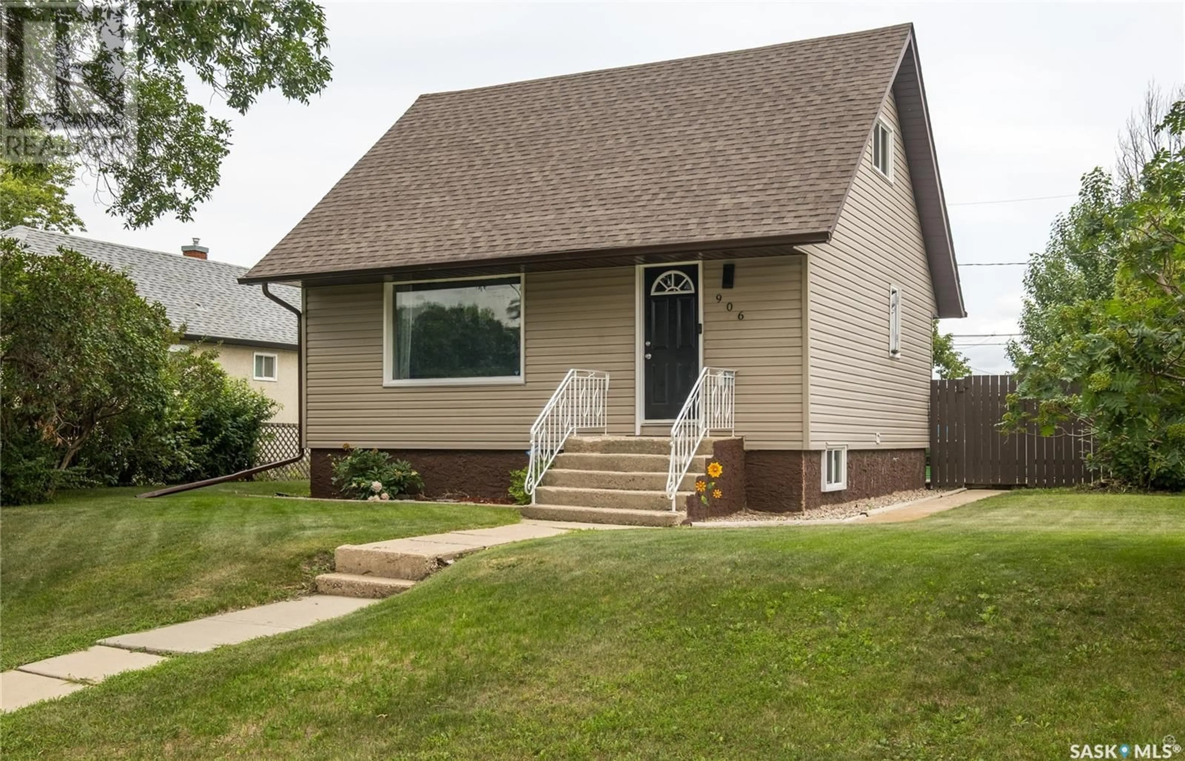 Home with vinyl exterior material, street for 906 1ST STREET, Prince Albert Saskatchewan S6V0C4
