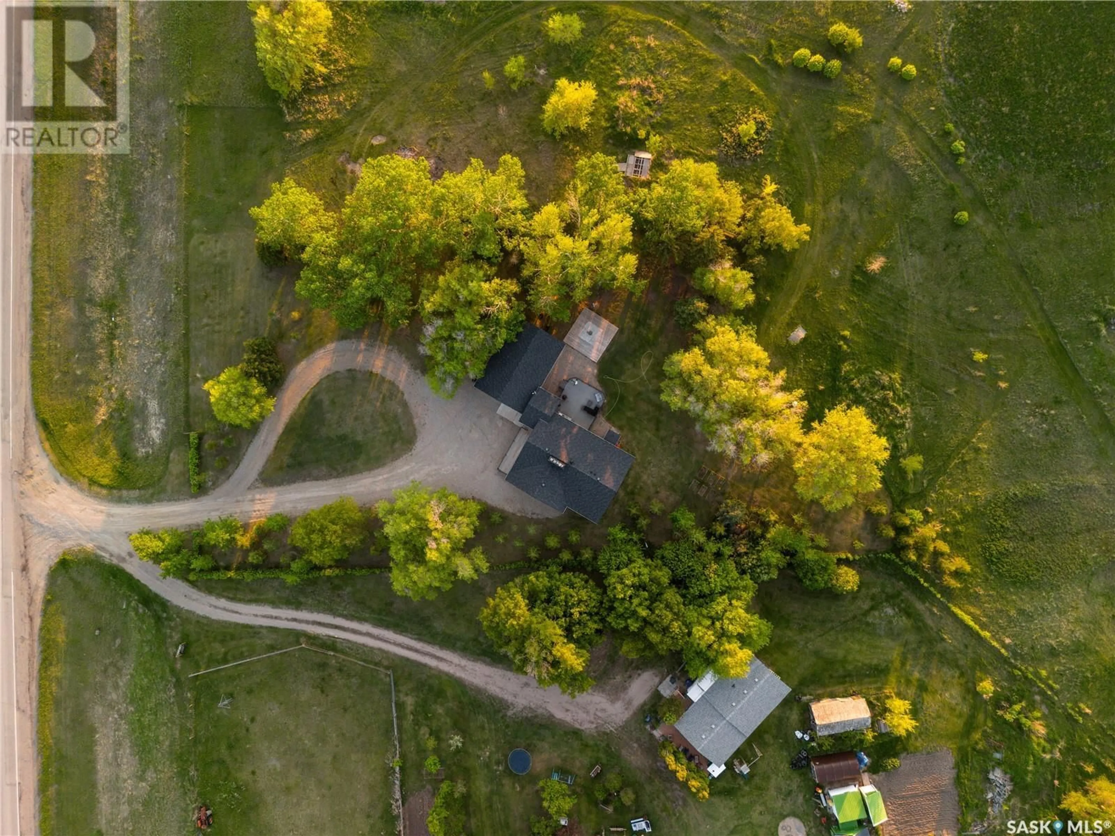 A pic from outside/outdoor area/front of a property/back of a property/a pic from drone, street for 11801 HWY 48, Edenwold Rm No. 158 Saskatchewan S4L5B1
