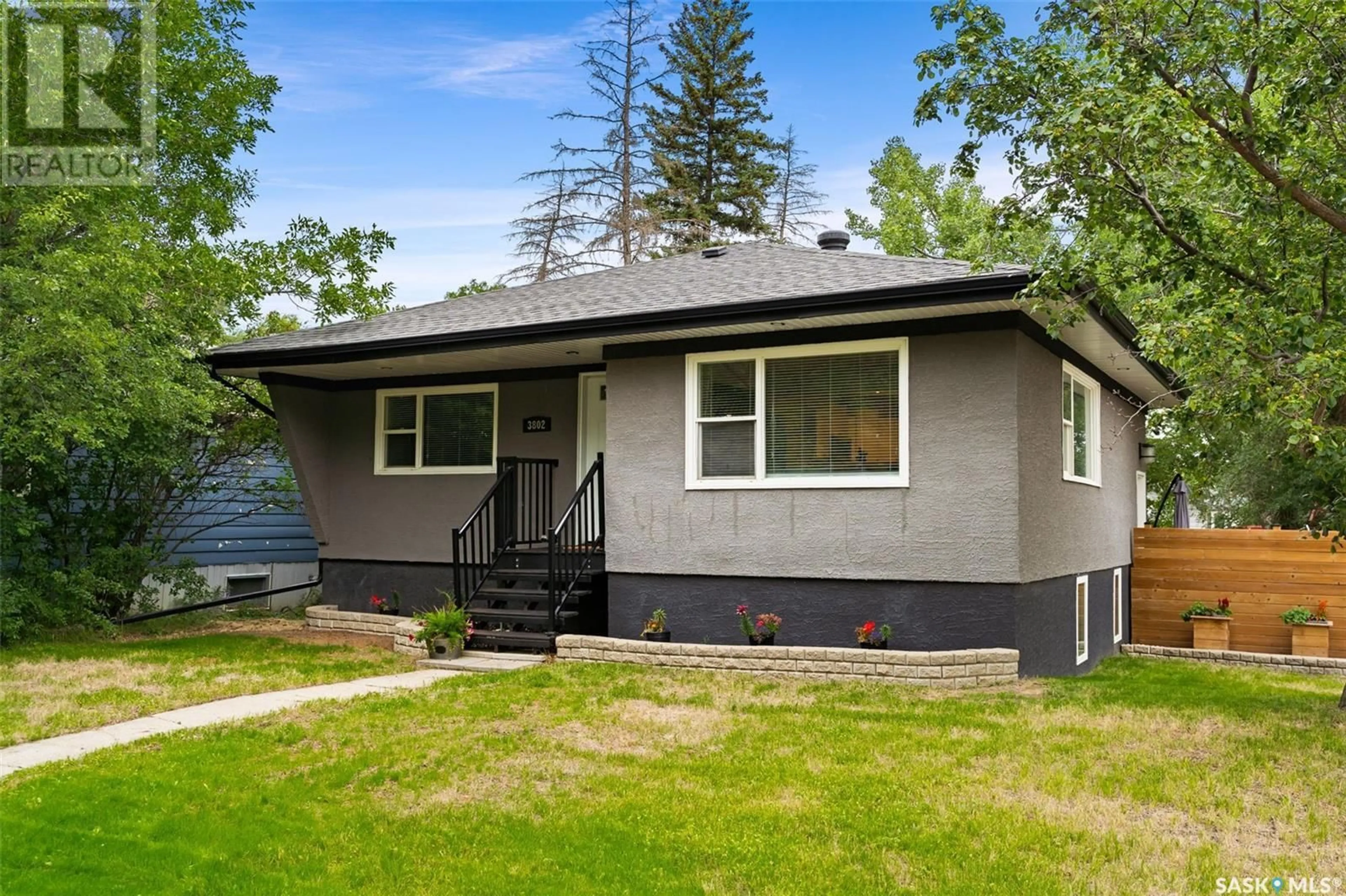 Home with vinyl exterior material, street for 3802 20TH AVENUE, Regina Saskatchewan S4S0P4
