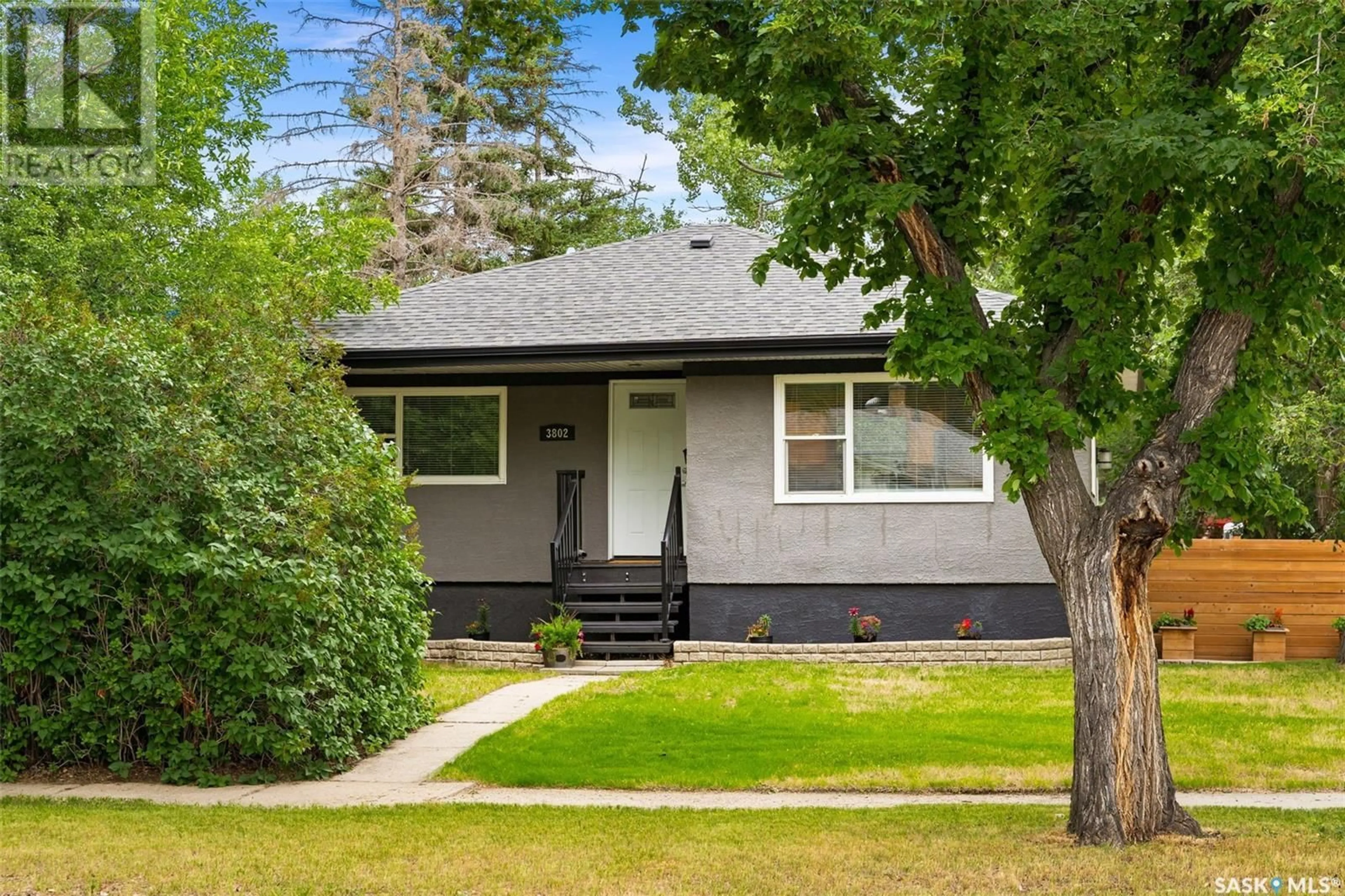Home with vinyl exterior material, street for 3802 20TH AVENUE, Regina Saskatchewan S4S0P4