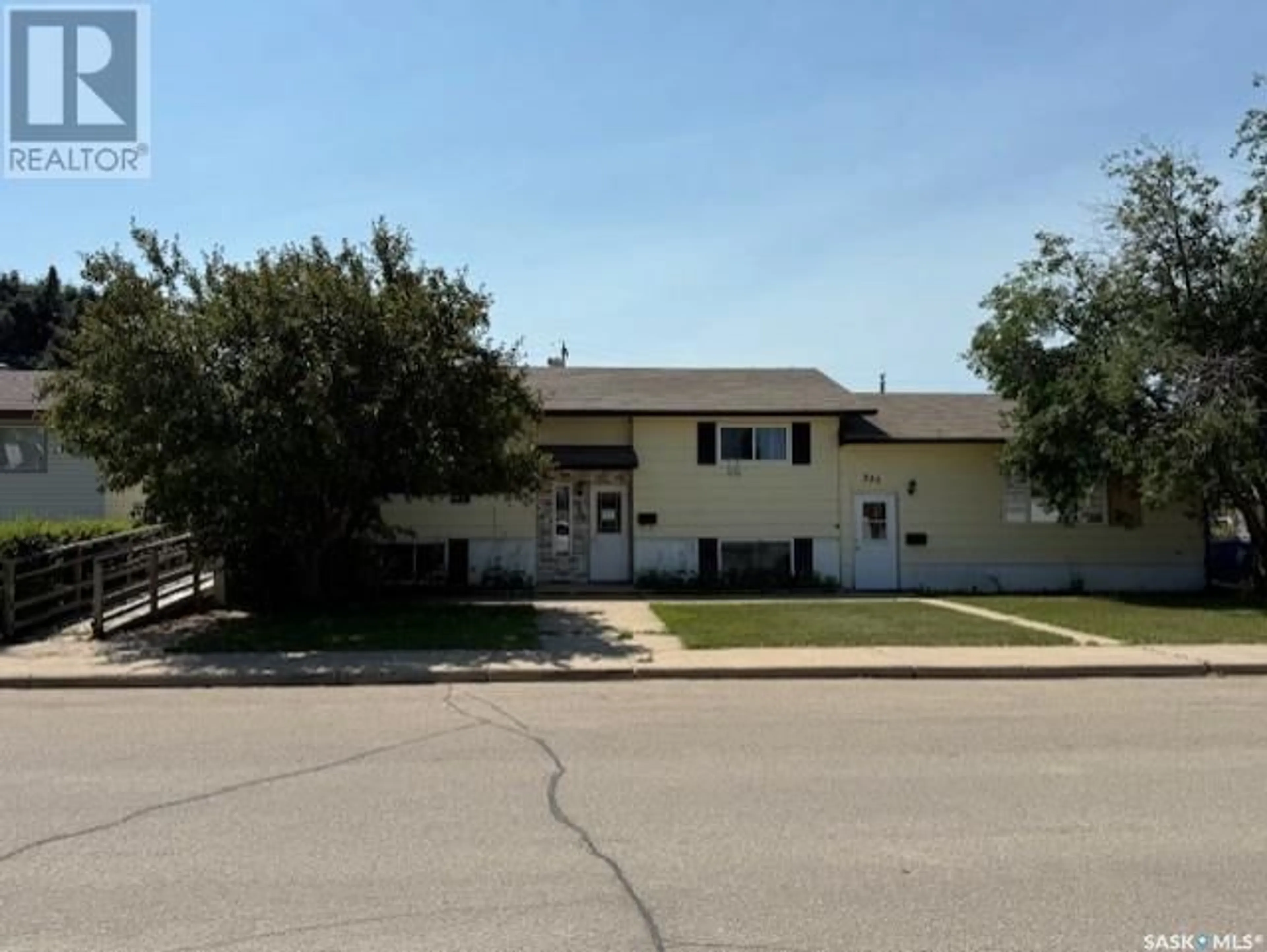 Home with vinyl exterior material, street for 345/349 3RD AVENUE, Melville Saskatchewan S0A2P0