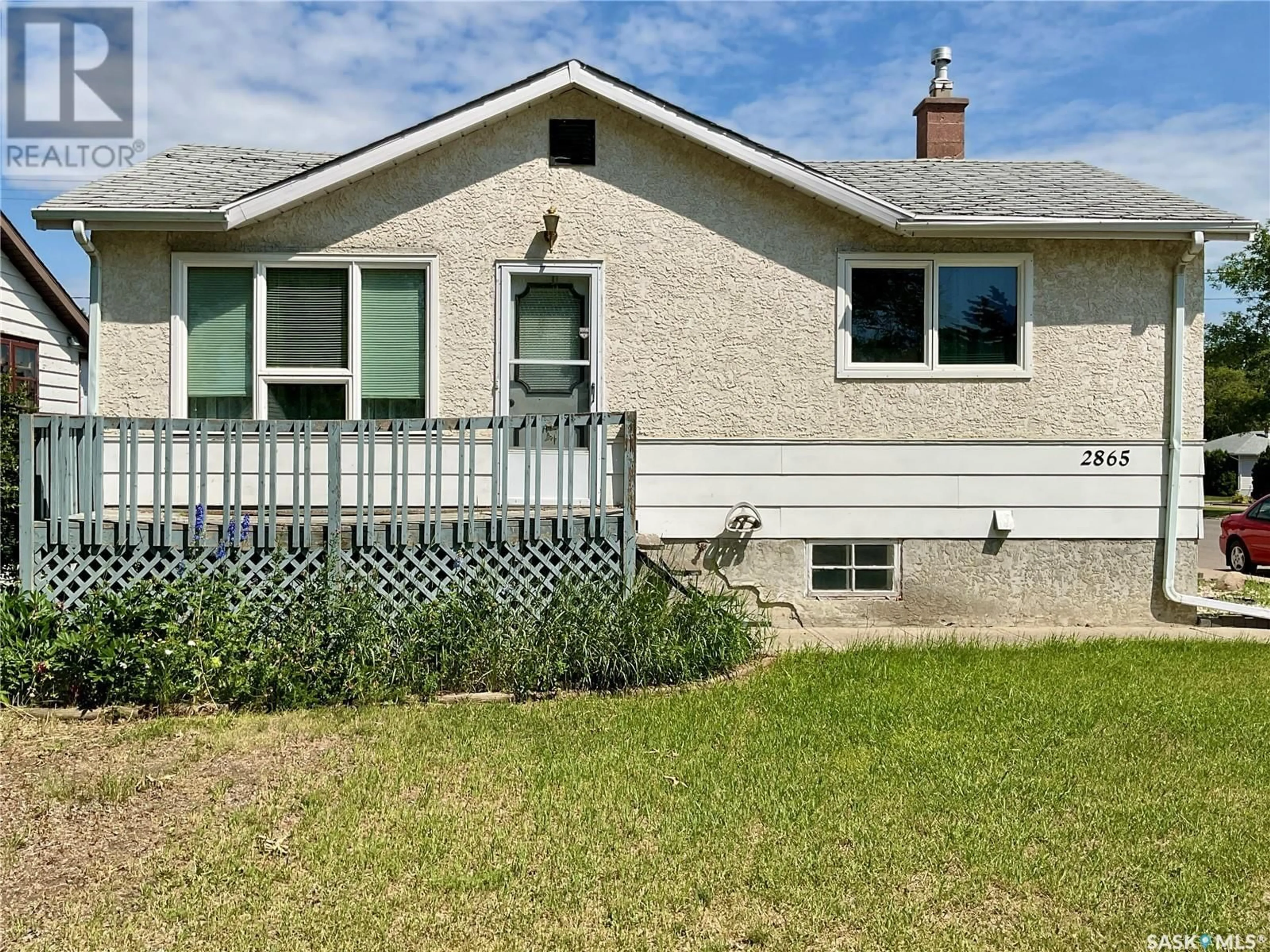 Home with vinyl exterior material, street for 2865 MCDONALD STREET, Regina Saskatchewan S4N3A1