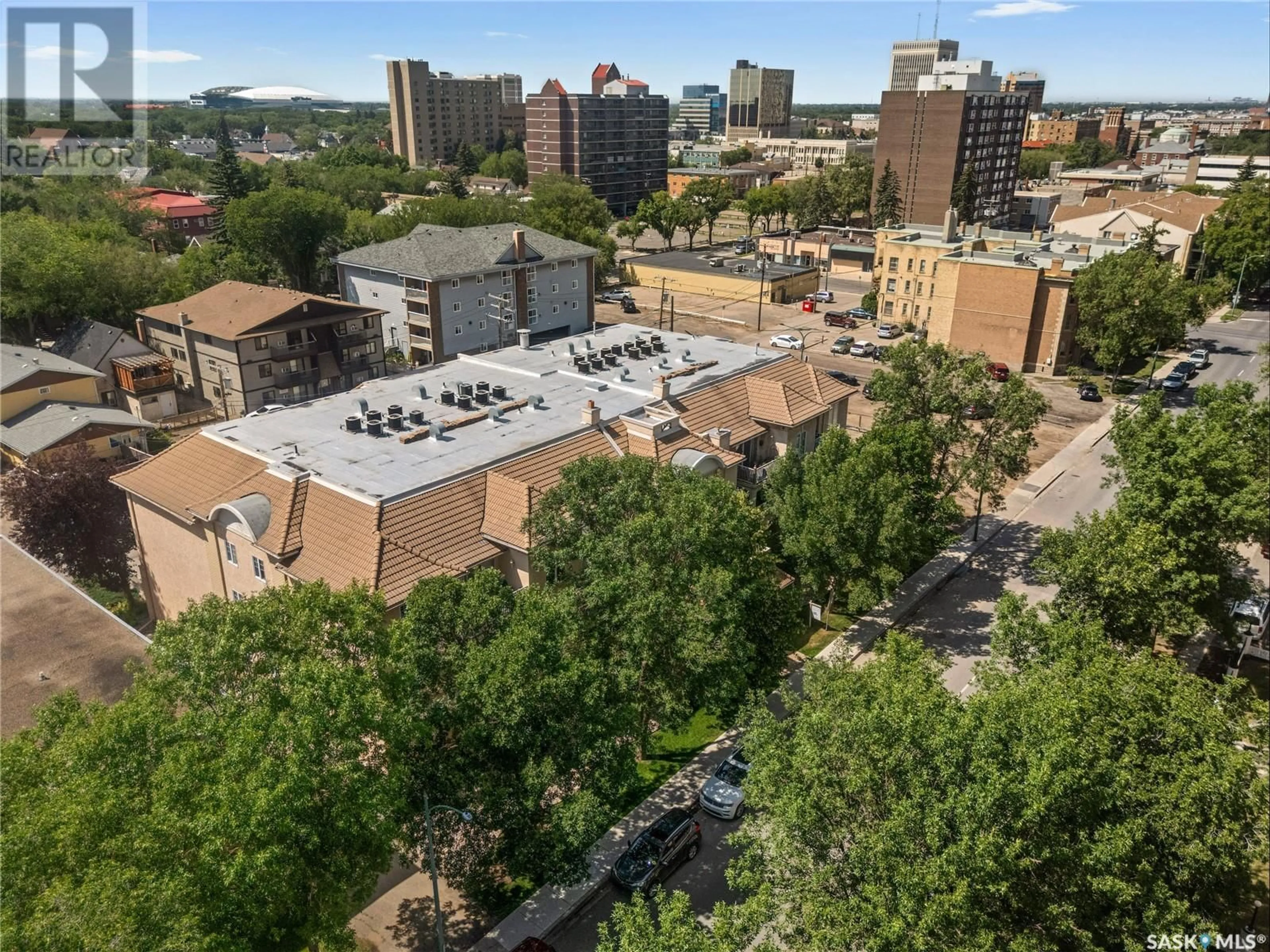 A pic from outside/outdoor area/front of a property/back of a property/a pic from drone, city buildings view from balcony for 205 - 2242 CORNWALL STREET, Regina Saskatchewan S4P2K9