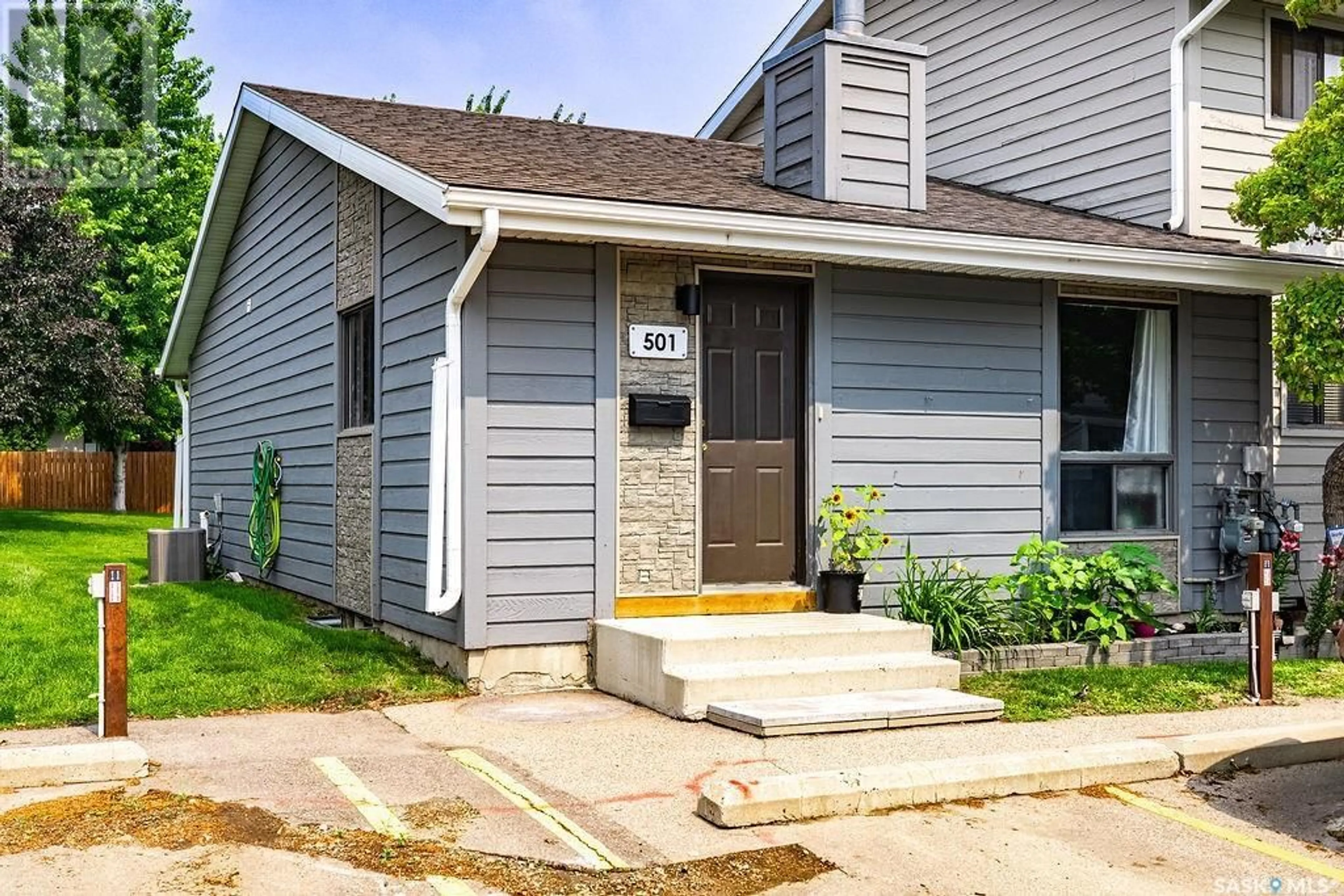 Home with vinyl exterior material, street for 501 145 SANDY COURT, Saskatoon Saskatchewan S7K6P8