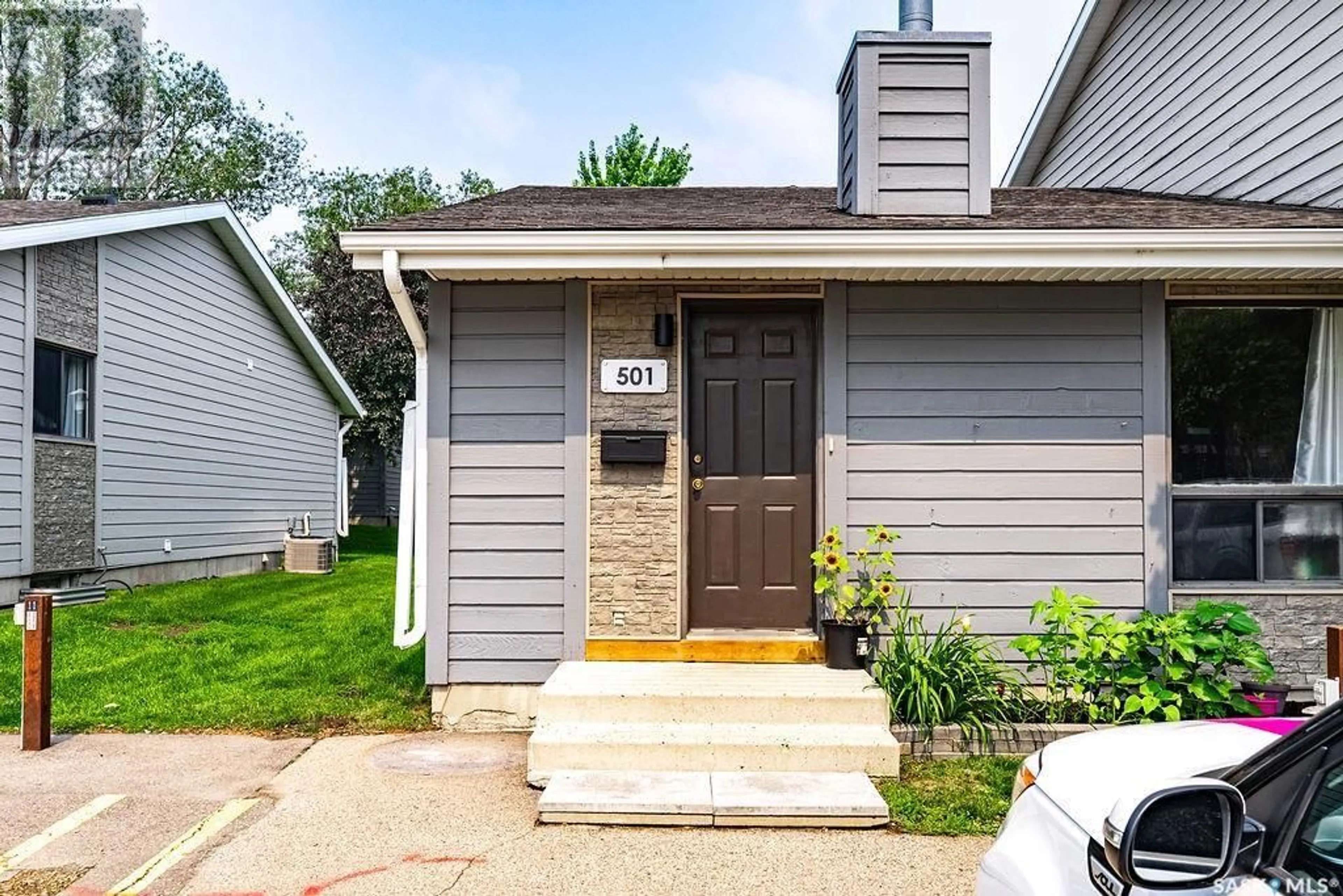 Home with vinyl exterior material, street for 501 145 SANDY COURT, Saskatoon Saskatchewan S7K6P8