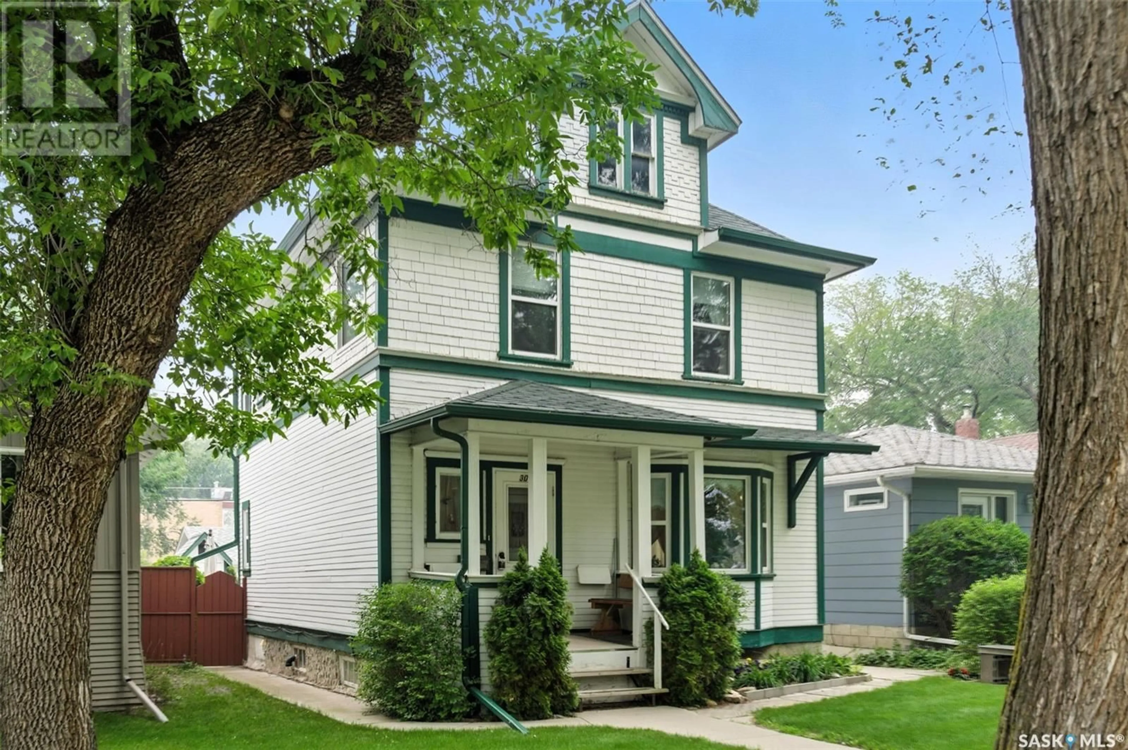 Home with vinyl exterior material, street for 306 31ST STREET, Saskatoon Saskatchewan S7L0P9