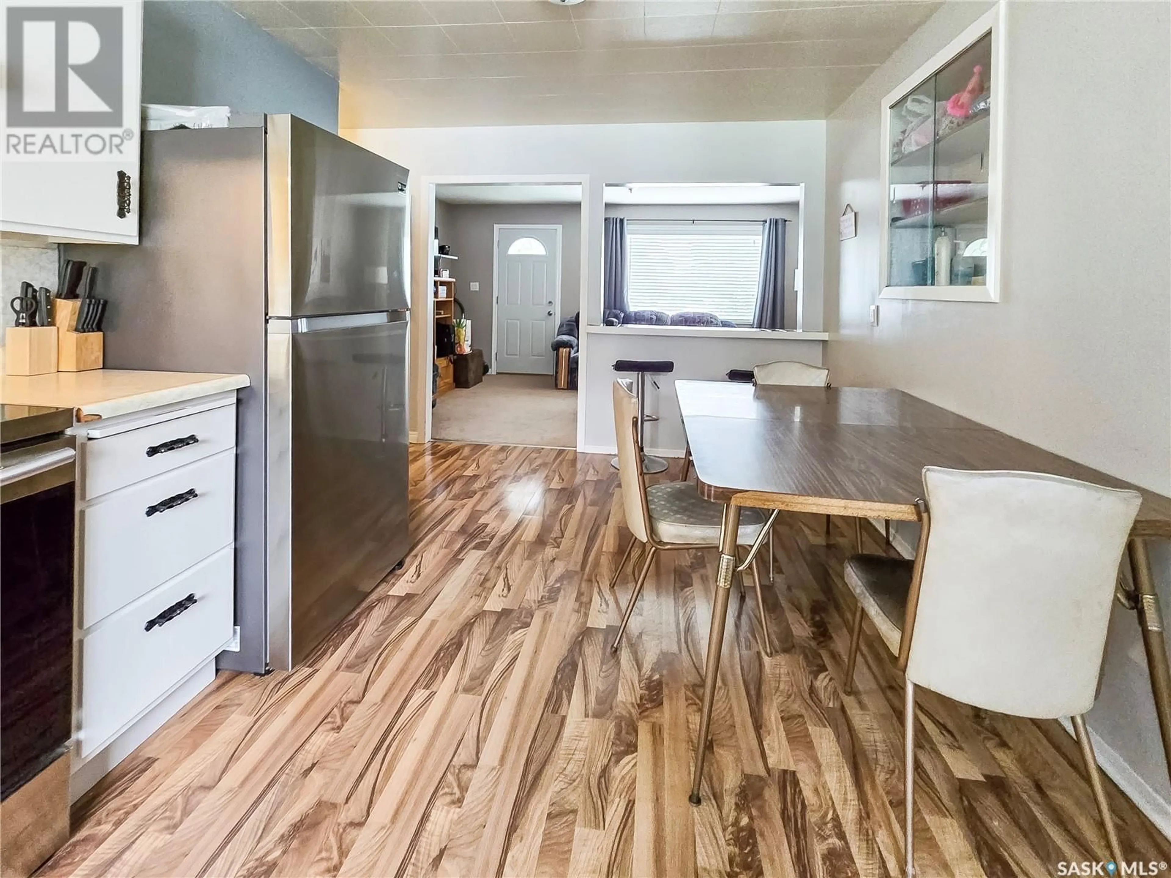 Open concept kitchen, wood/laminate floor for 1013 BOYLE STREET, Indian Head Saskatchewan S0G2K0