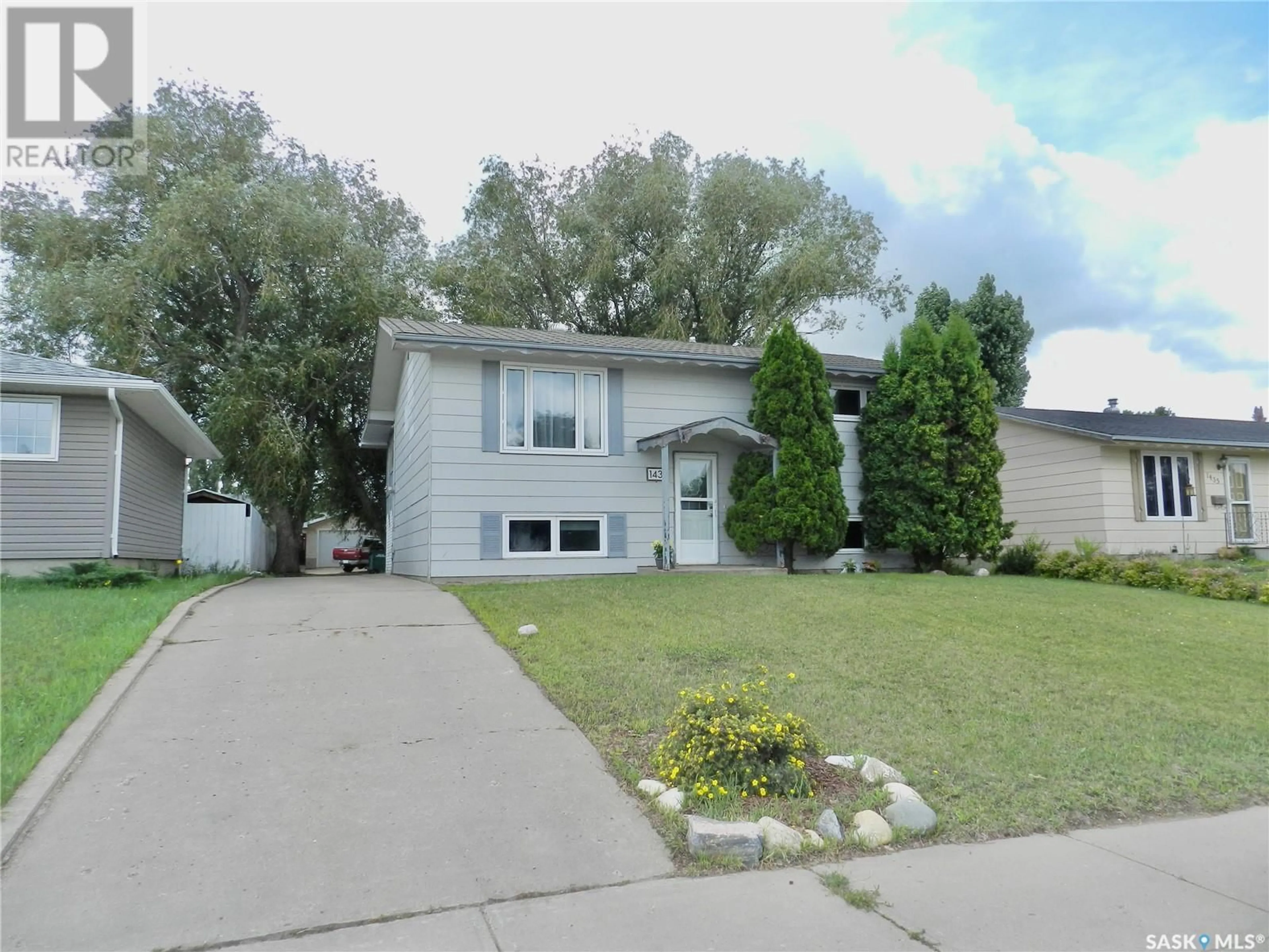 Home with vinyl exterior material, street for 1431 SMITH STREET, Moose Jaw Saskatchewan S6H6W6