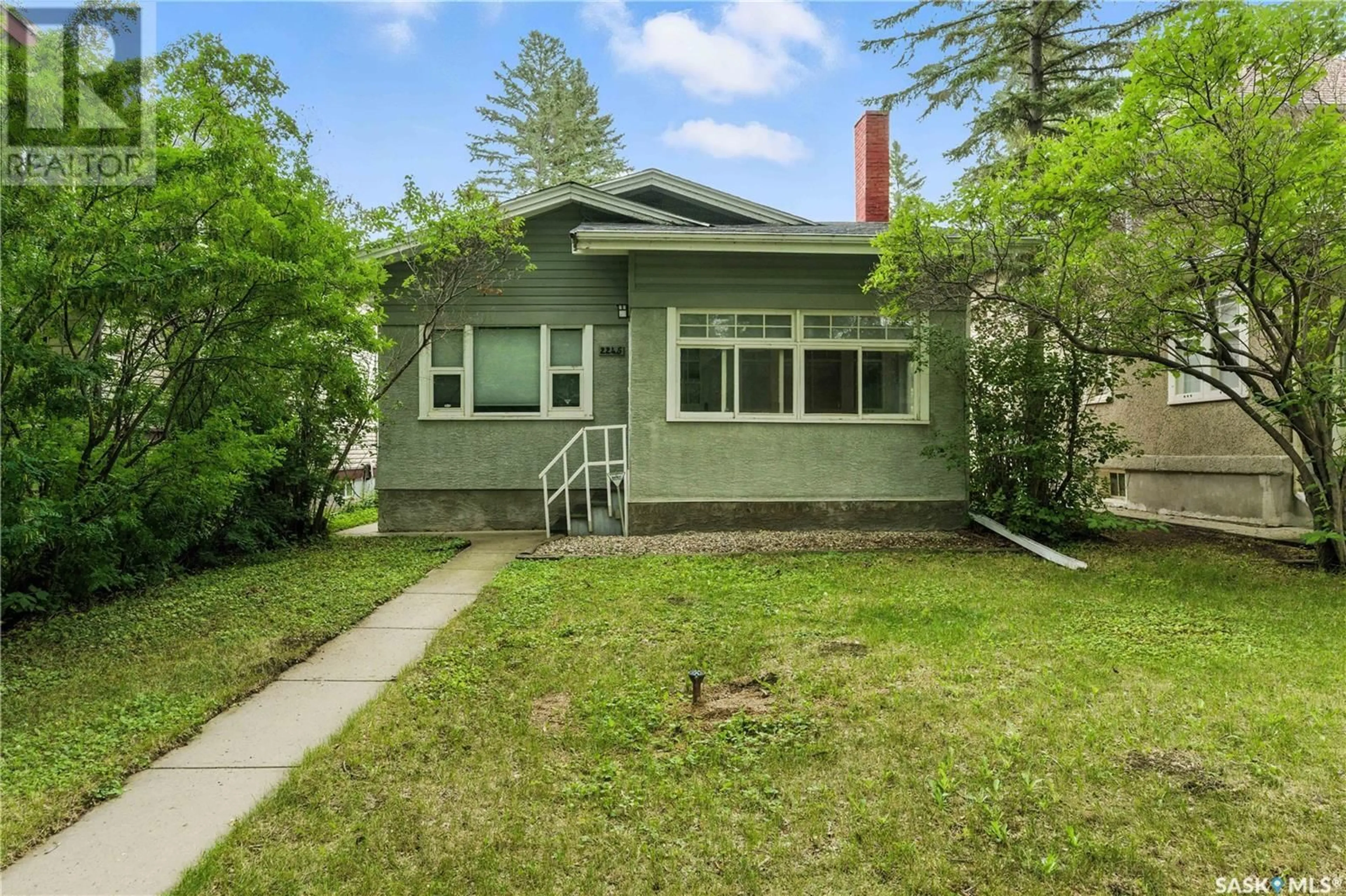 Home with vinyl exterior material, street for 2245 GARNET STREET, Regina Saskatchewan S4T3A1