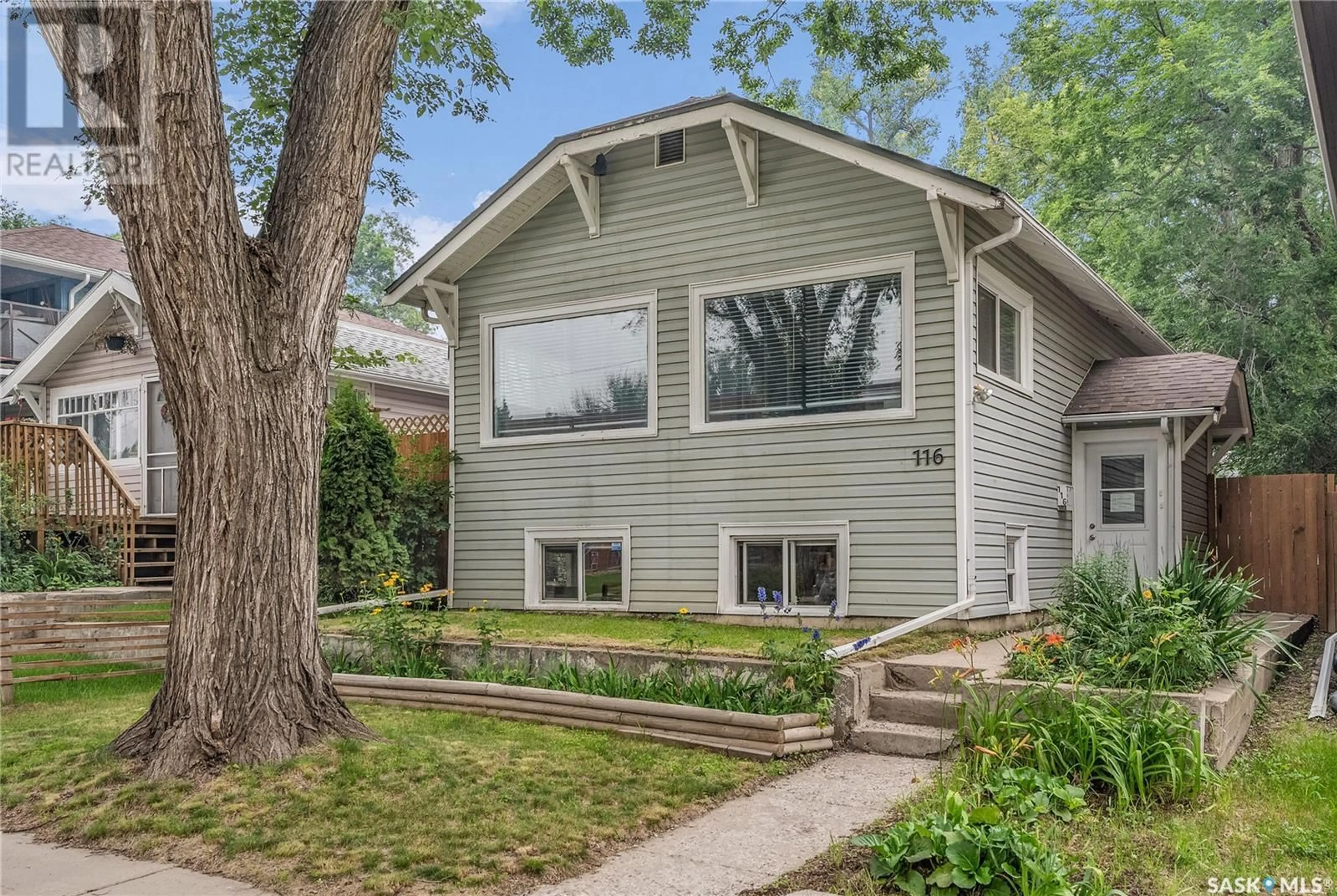 Home with vinyl exterior material, street for 116 27TH STREET, Saskatoon Saskatchewan S7L0J3