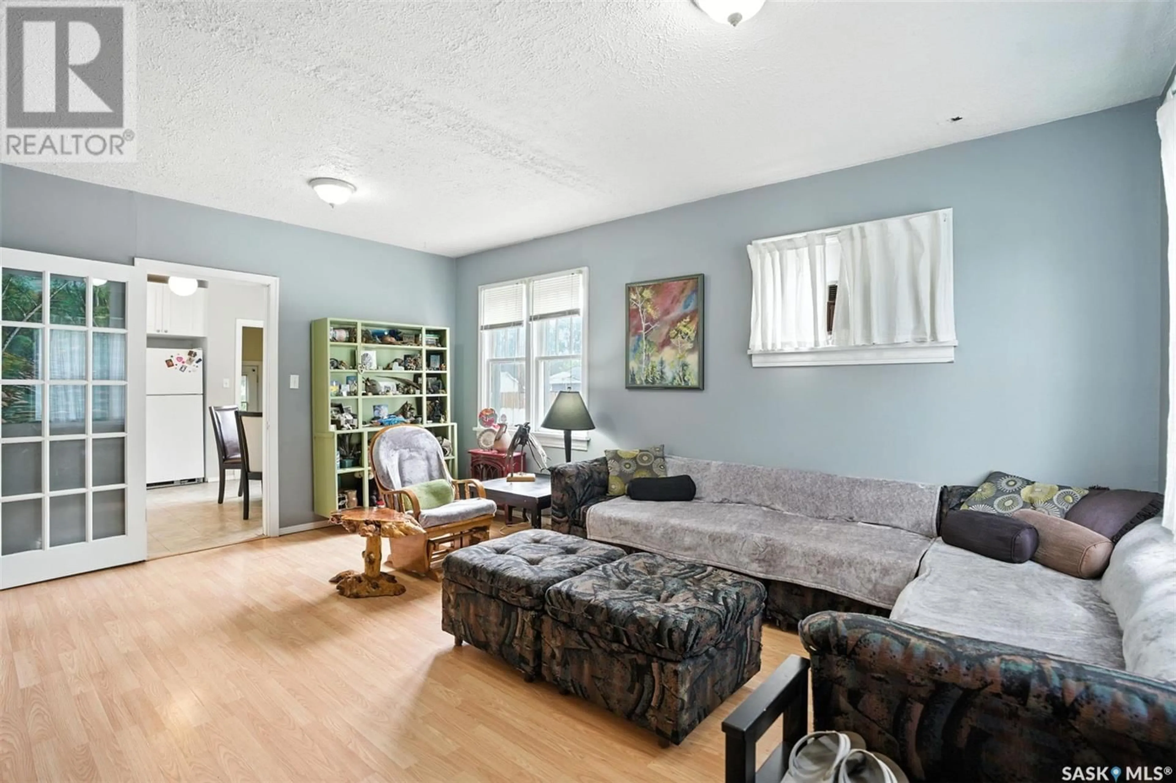 Living room with furniture, unknown for 214 L AVENUE, Saskatoon Saskatchewan S7L2P4