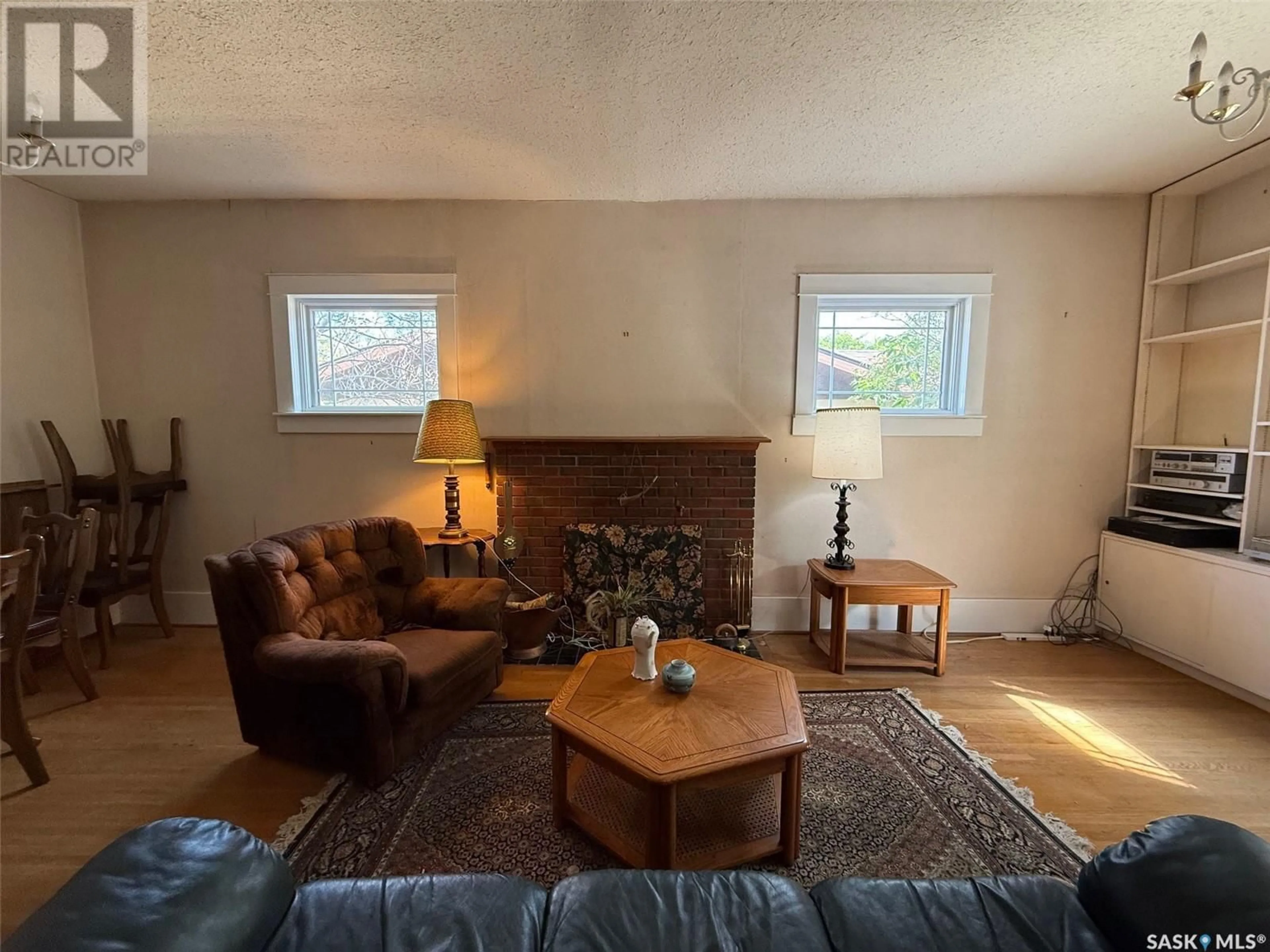 Living room with furniture, unknown for 1401 107TH STREET, North Battleford Saskatchewan S9A1Z8