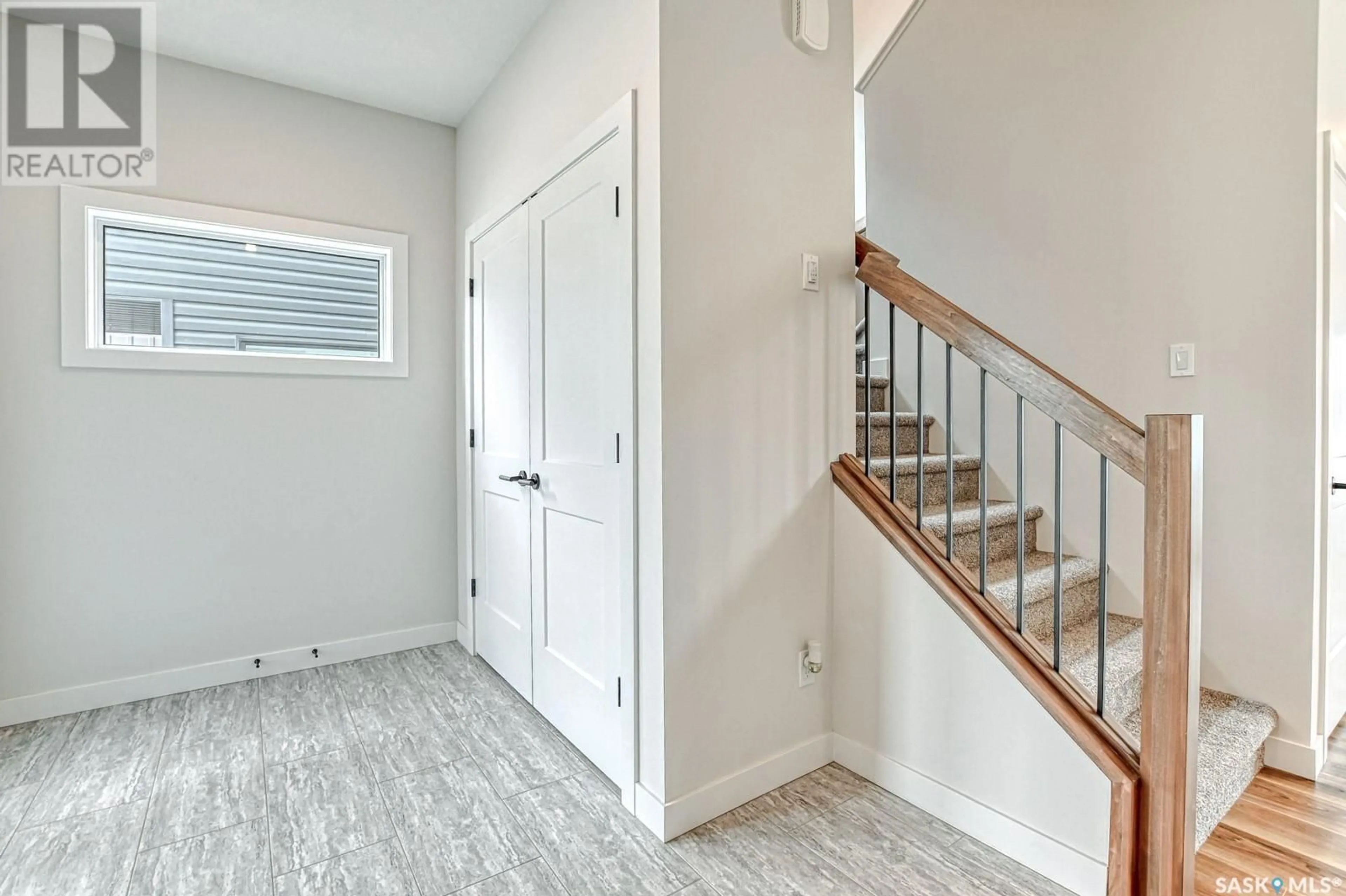 Indoor entryway for 22 MACKENZIE CRESCENT, Pilot Butte Saskatchewan S0G3Z0
