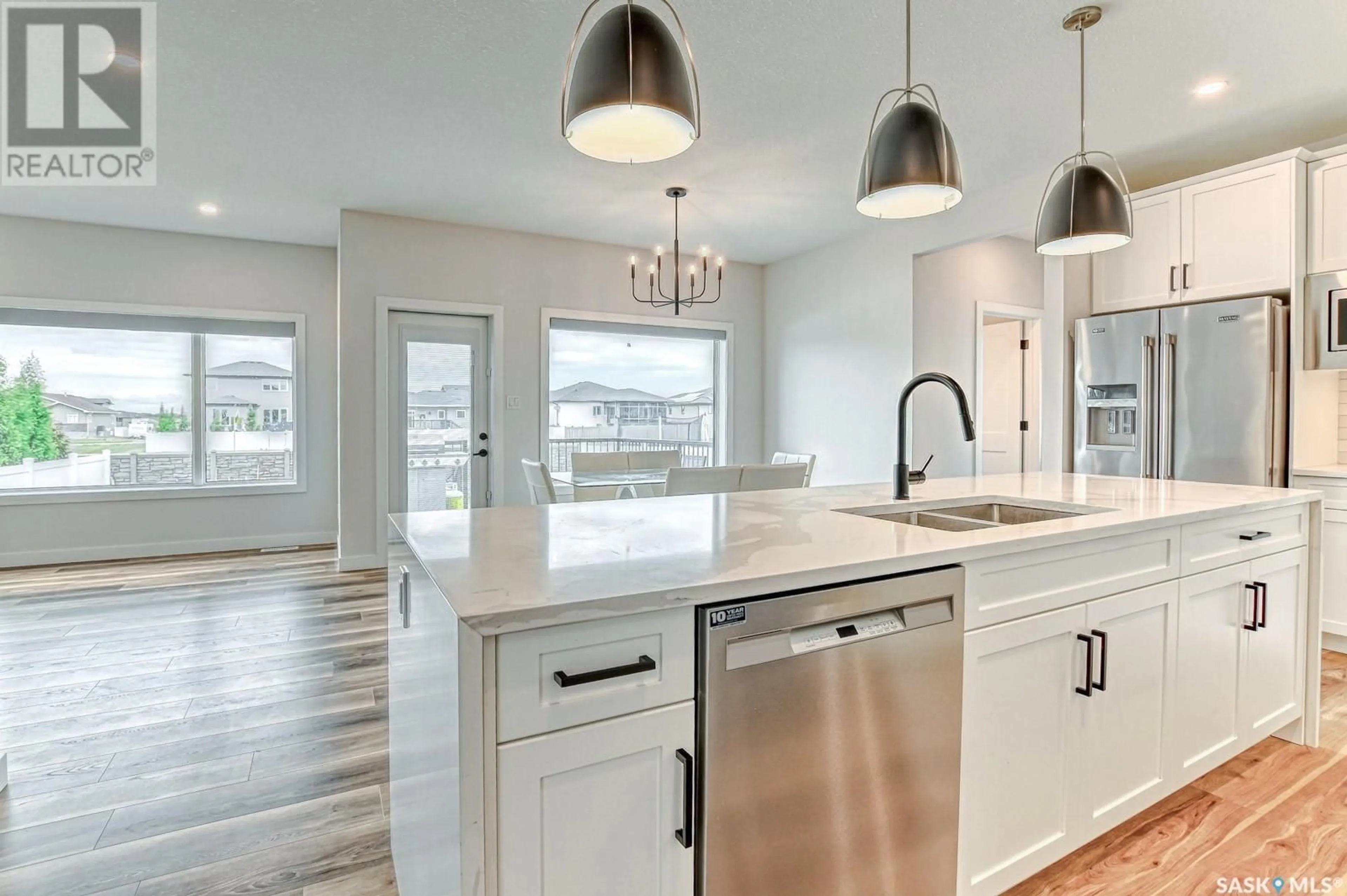 Open concept kitchen, unknown for 22 MACKENZIE CRESCENT, Pilot Butte Saskatchewan S0G3Z0