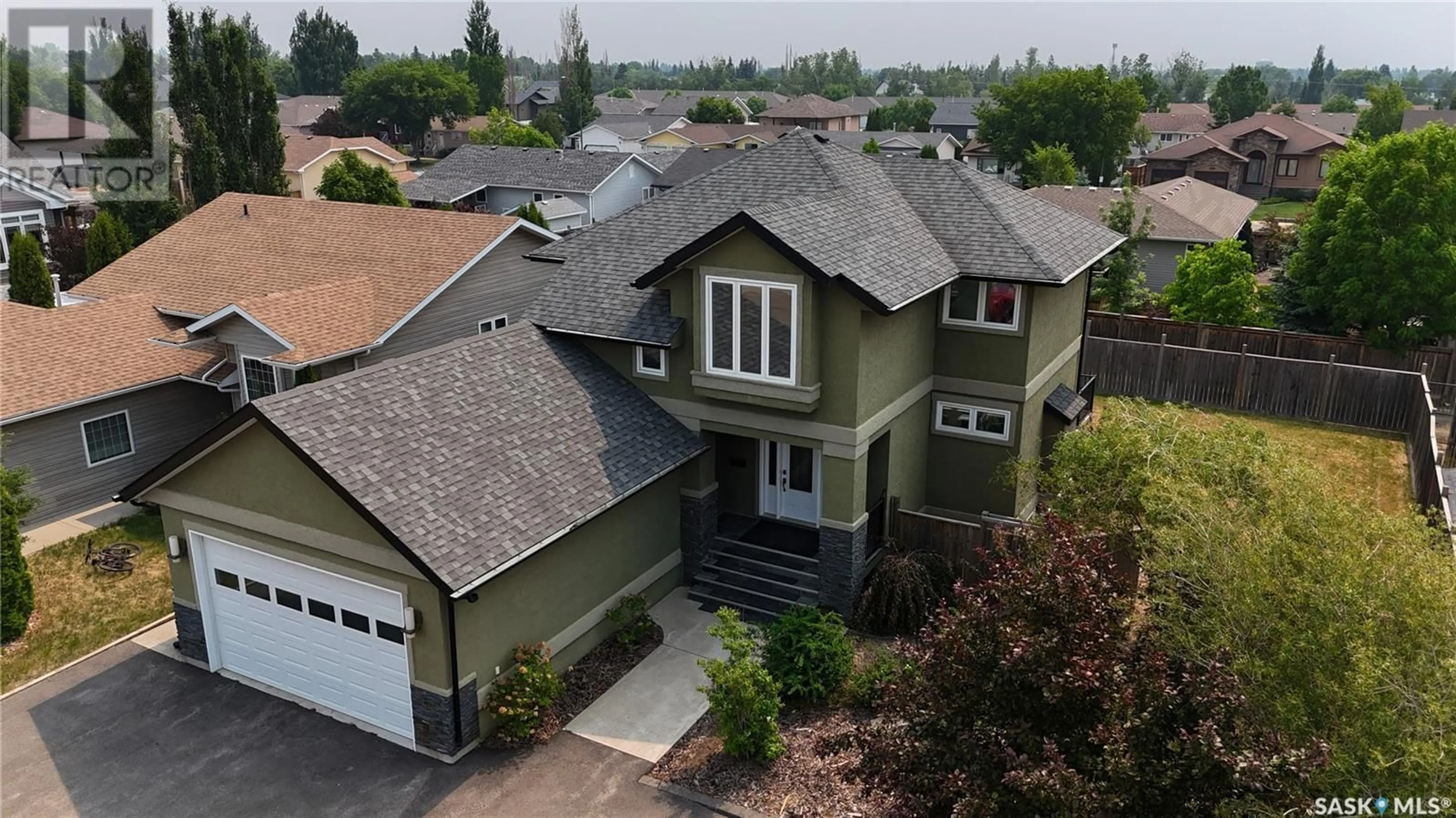 A pic from outside/outdoor area/front of a property/back of a property/a pic from drone, street for 10304 BUNCE CRESCENT, North Battleford Saskatchewan S9A3Y5