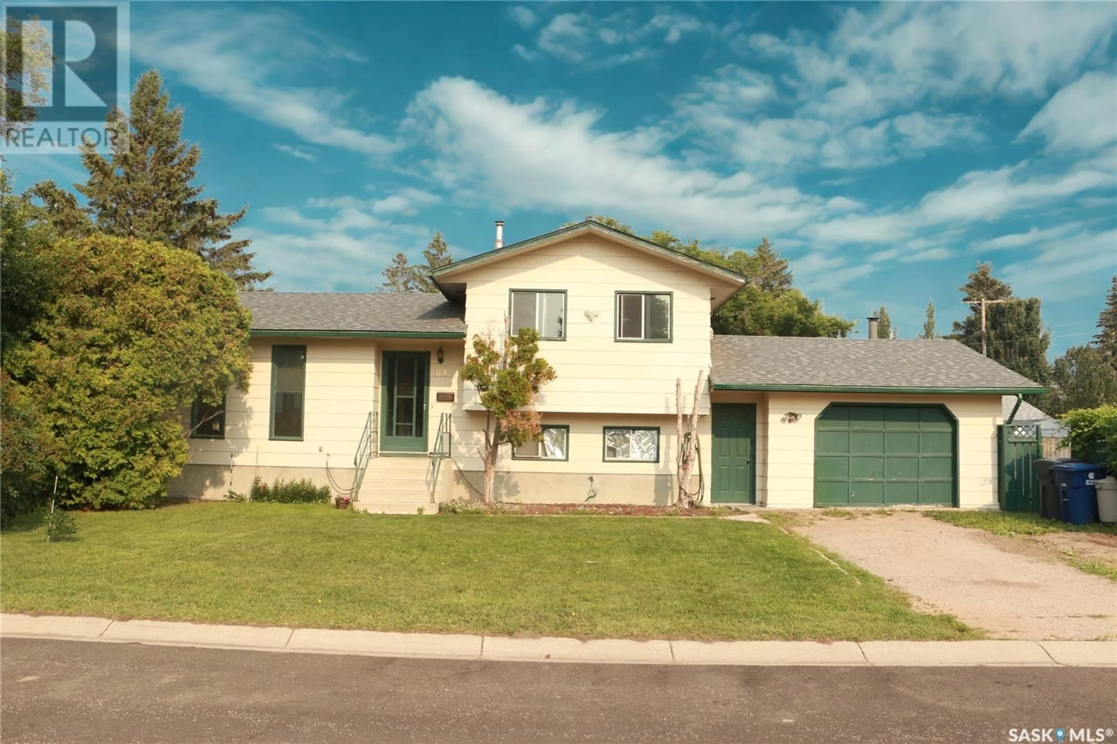 Home with vinyl exterior material, street for 201 CANORA STREET, Warman Saskatchewan S0K0A1