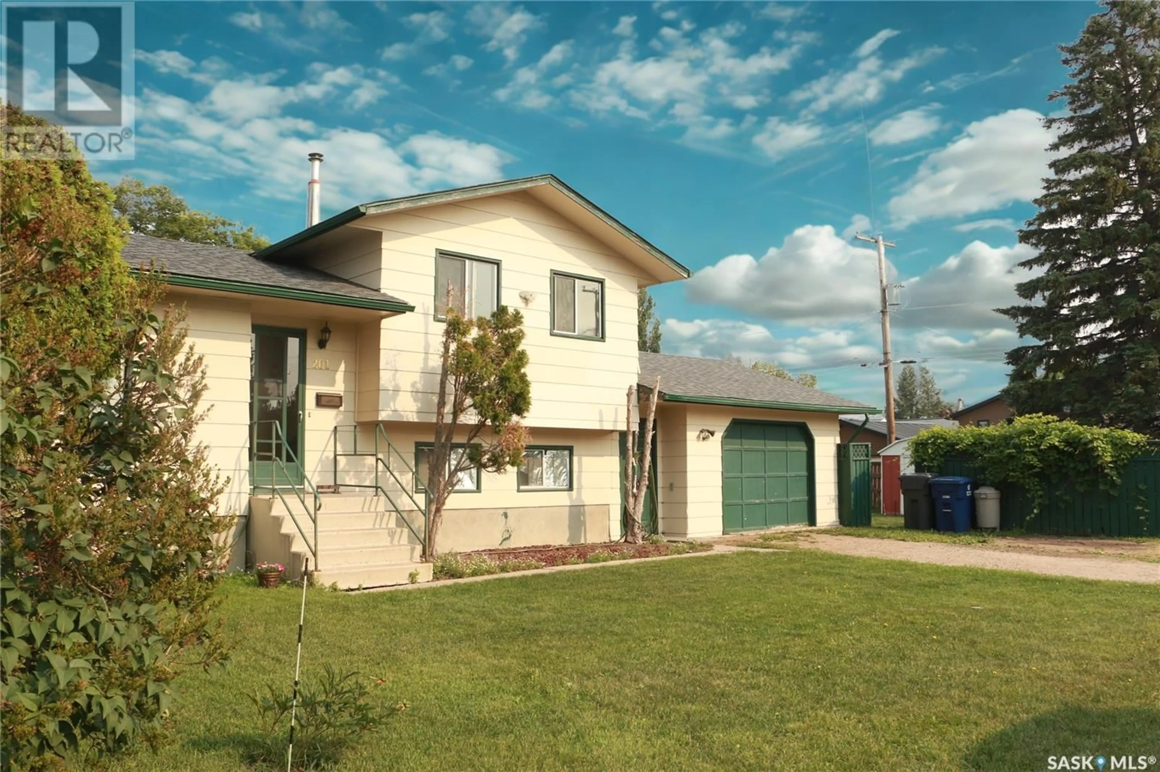 Home with vinyl exterior material, street for 201 CANORA STREET, Warman Saskatchewan S0K0A1
