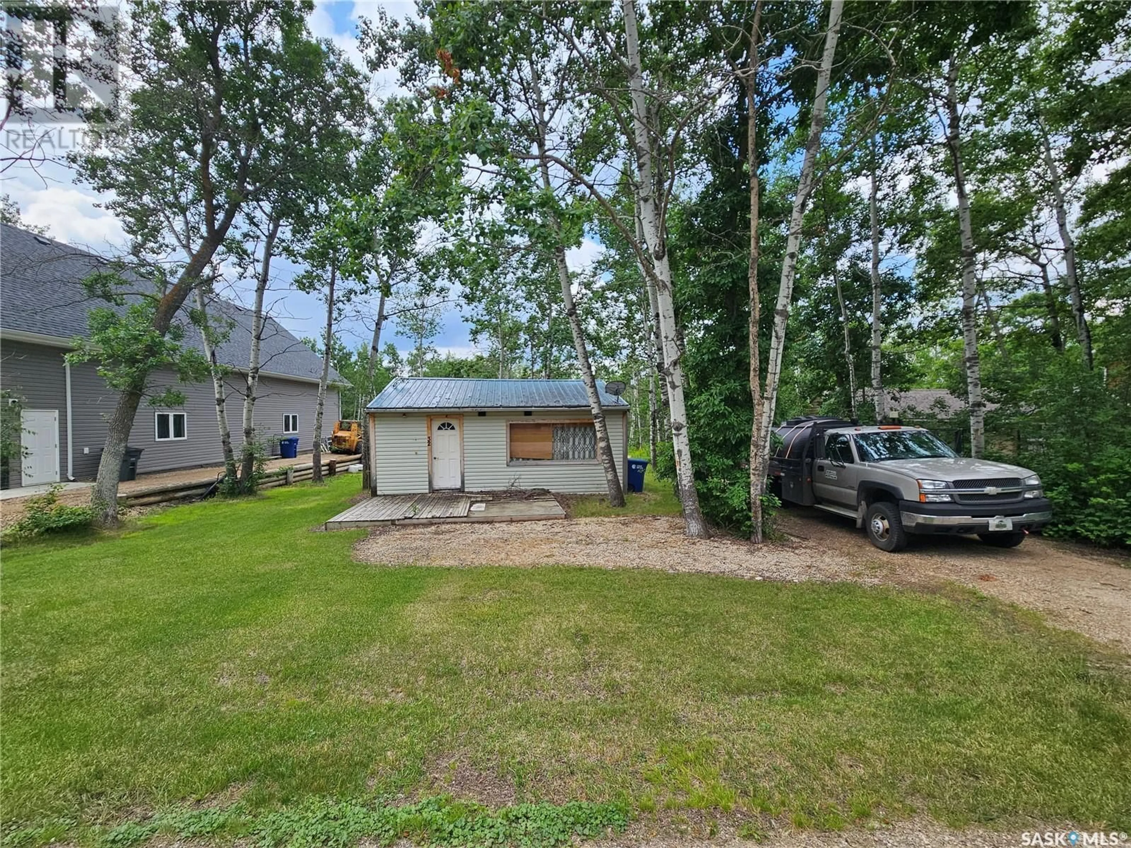 A pic from outside/outdoor area/front of a property/back of a property/a pic from drone, street for 32 CREE CRESCENT, Moose Mountain Provincial Park Saskatchewan S0C2S0