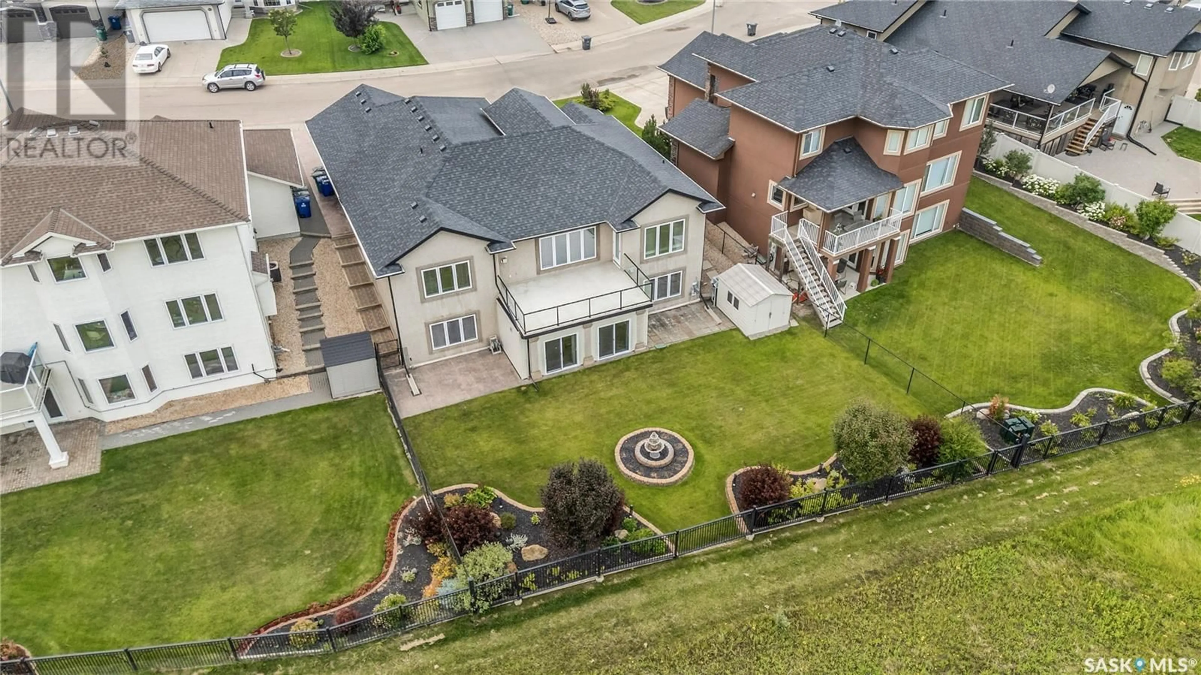 A pic from outside/outdoor area/front of a property/back of a property/a pic from drone, unknown for 247 BEECHDALE COURT, Saskatoon Saskatchewan S7V0A4