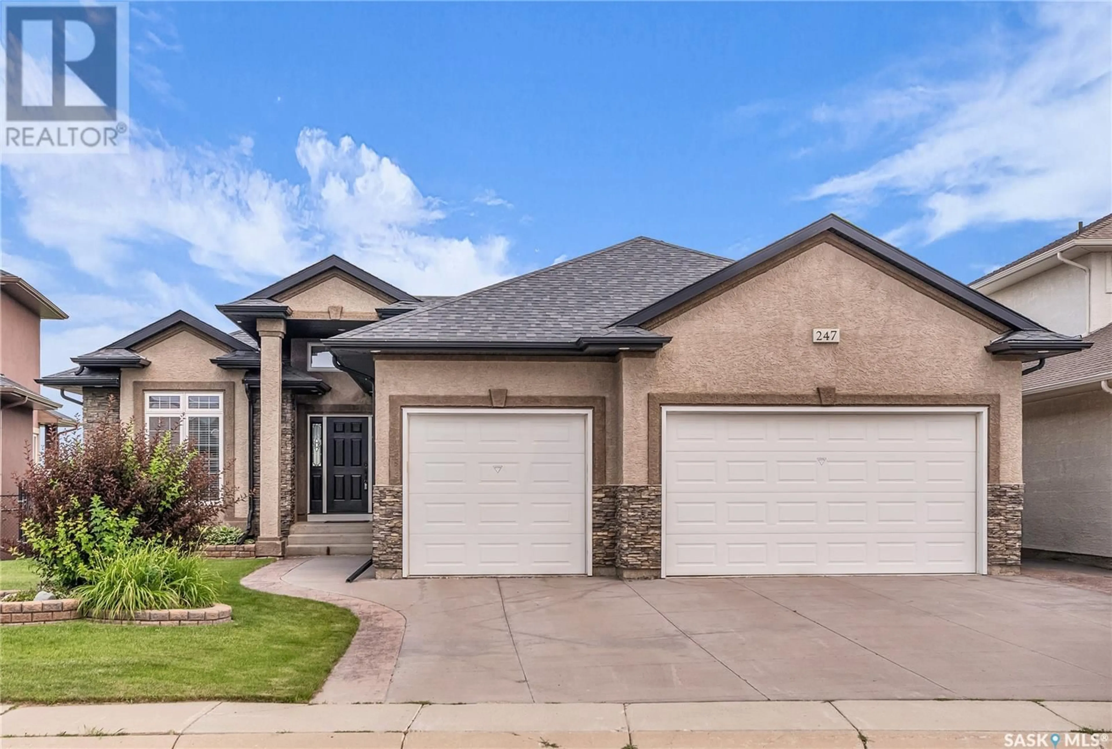 Home with brick exterior material, street for 247 BEECHDALE COURT, Saskatoon Saskatchewan S7V0A4