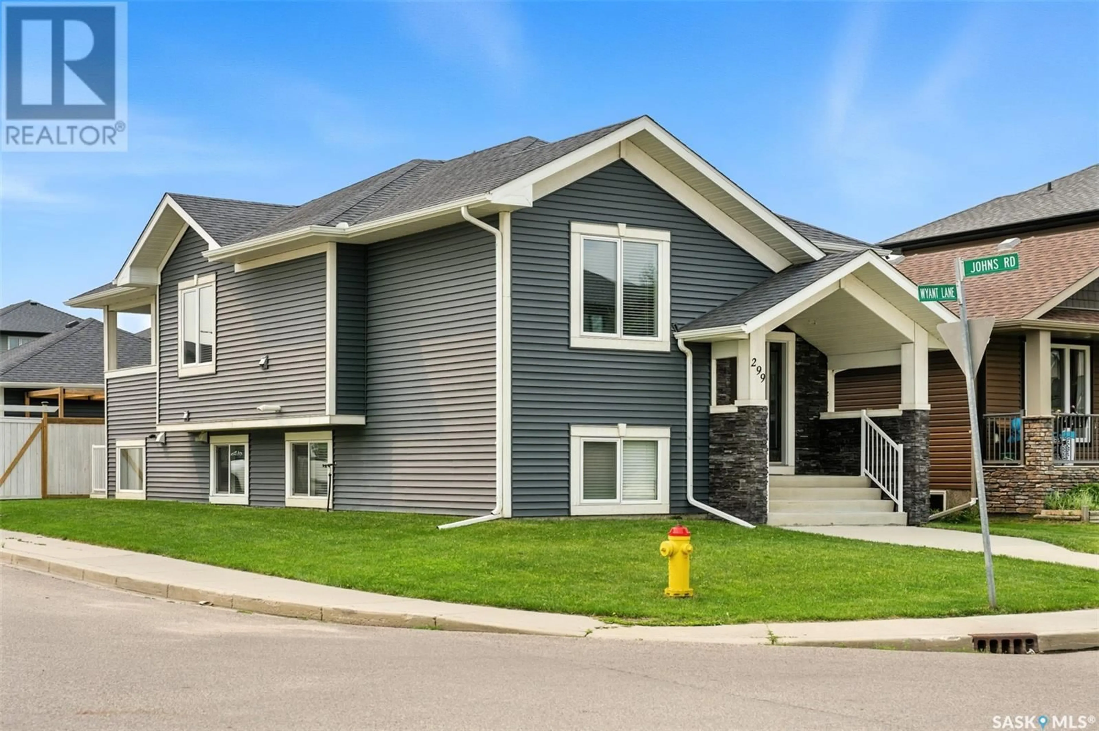 Home with vinyl exterior material, street for 299 WYANT LANE, Saskatoon Saskatchewan S7W0L3
