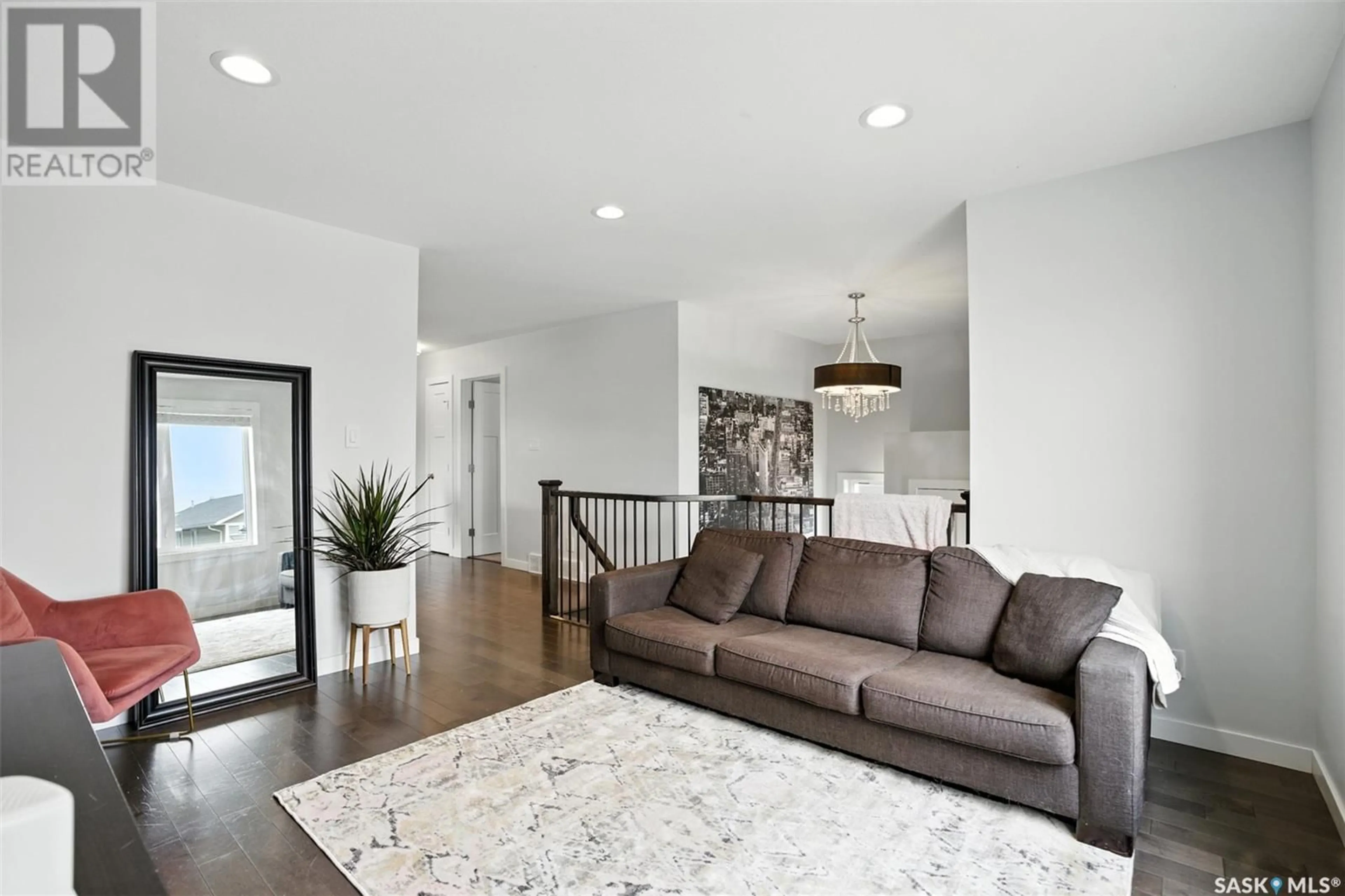 Living room with furniture, unknown for 299 WYANT LANE, Saskatoon Saskatchewan S7W0L3