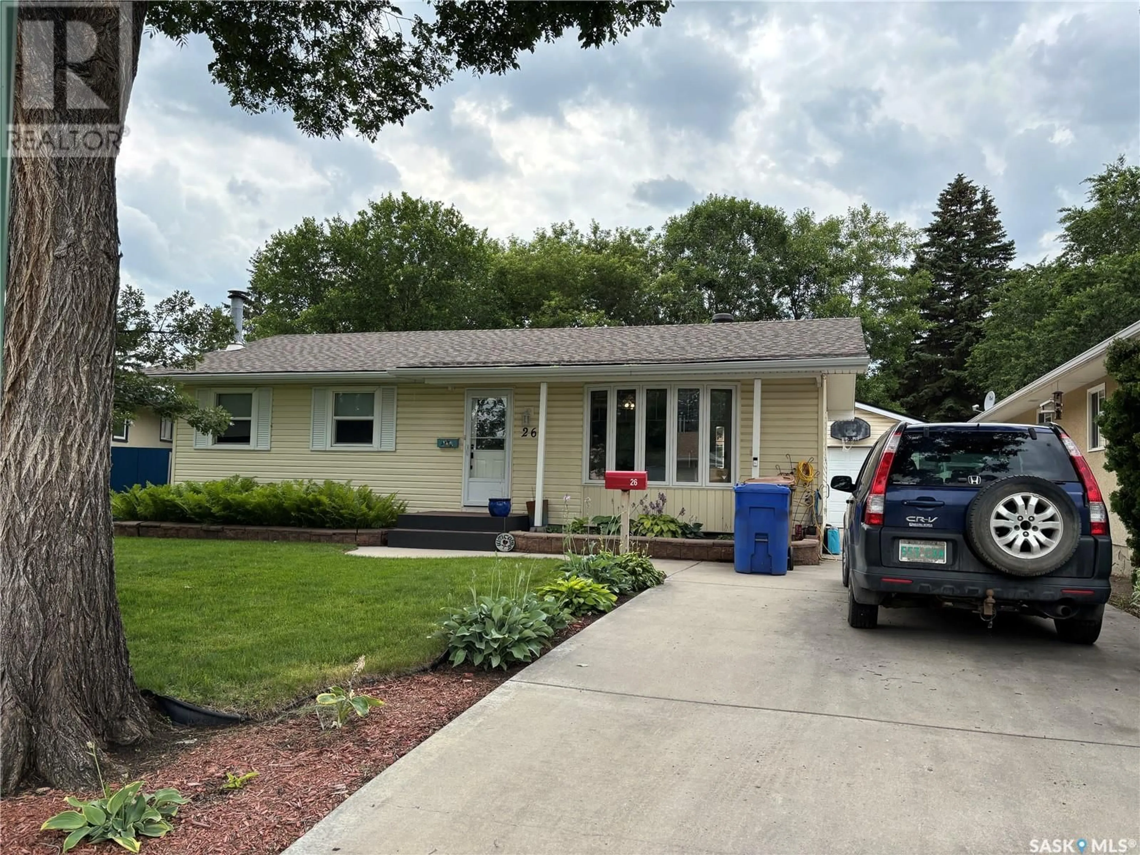 Home with vinyl exterior material, street for 26 JOYCE CRESCENT, Regina Saskatchewan S4N5G3