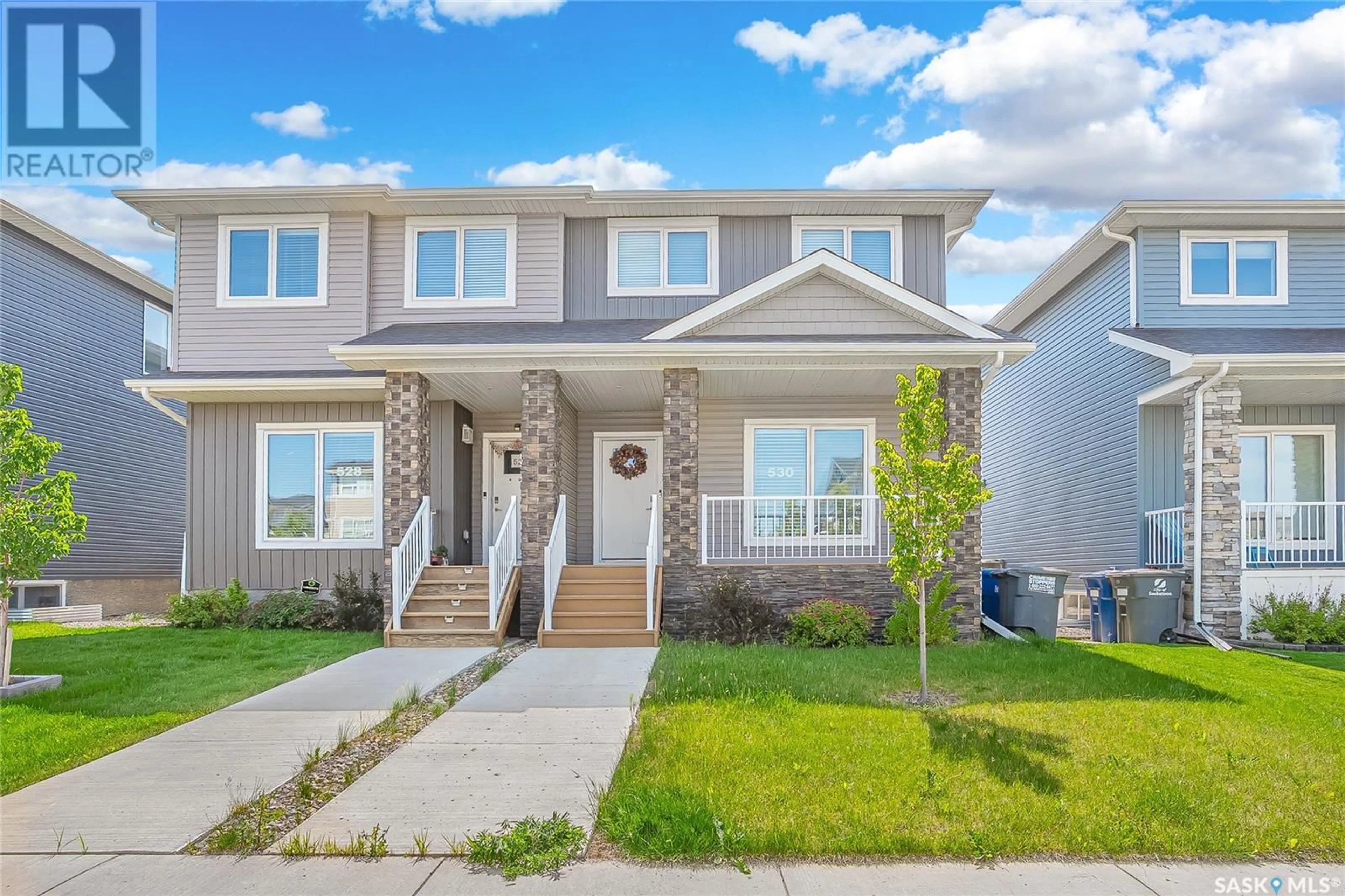 Home with brick exterior material, street for 530 BRIGHTON GATE, Saskatoon Saskatchewan S7V0V6