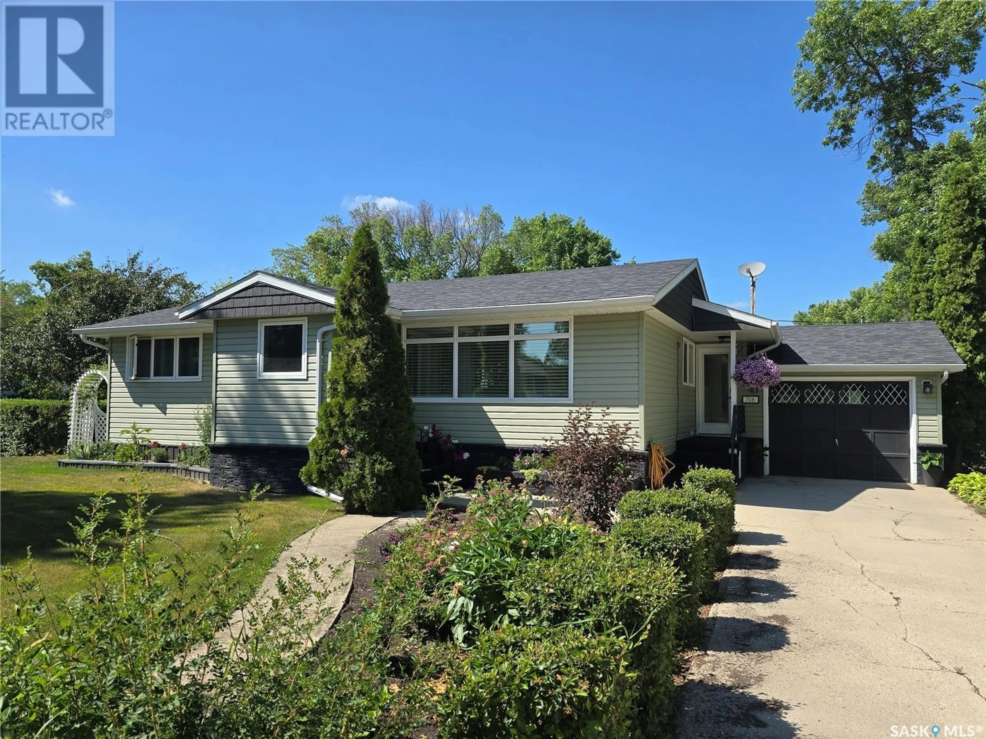 Home with vinyl exterior material, street for 708 WOLSELEY AVENUE, Grenfell Saskatchewan S0G2B0