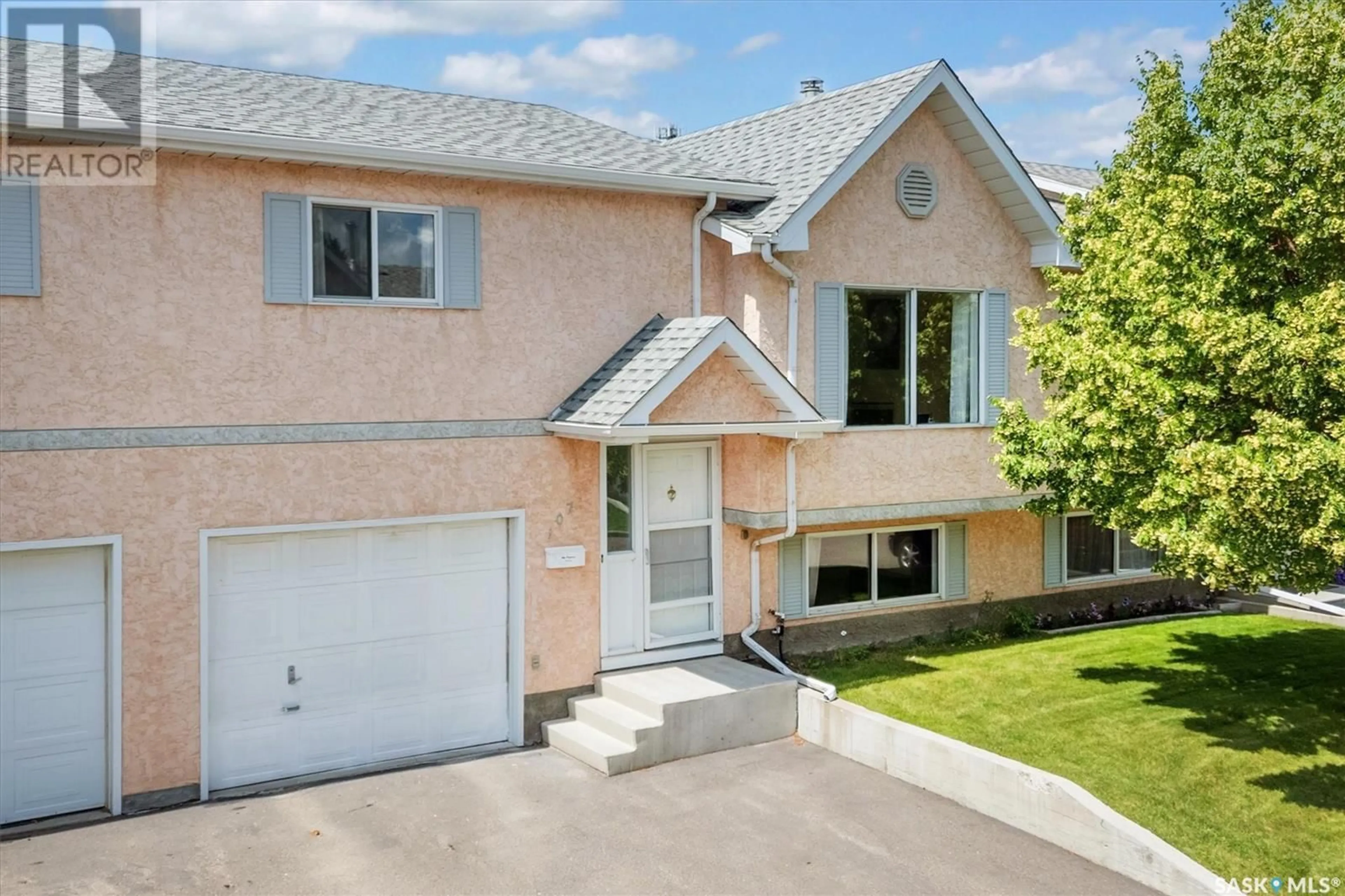 Home with vinyl exterior material, street for 107 - 610 PEREHUDOFF CRESCENT, Saskatoon Saskatchewan S7N4H5