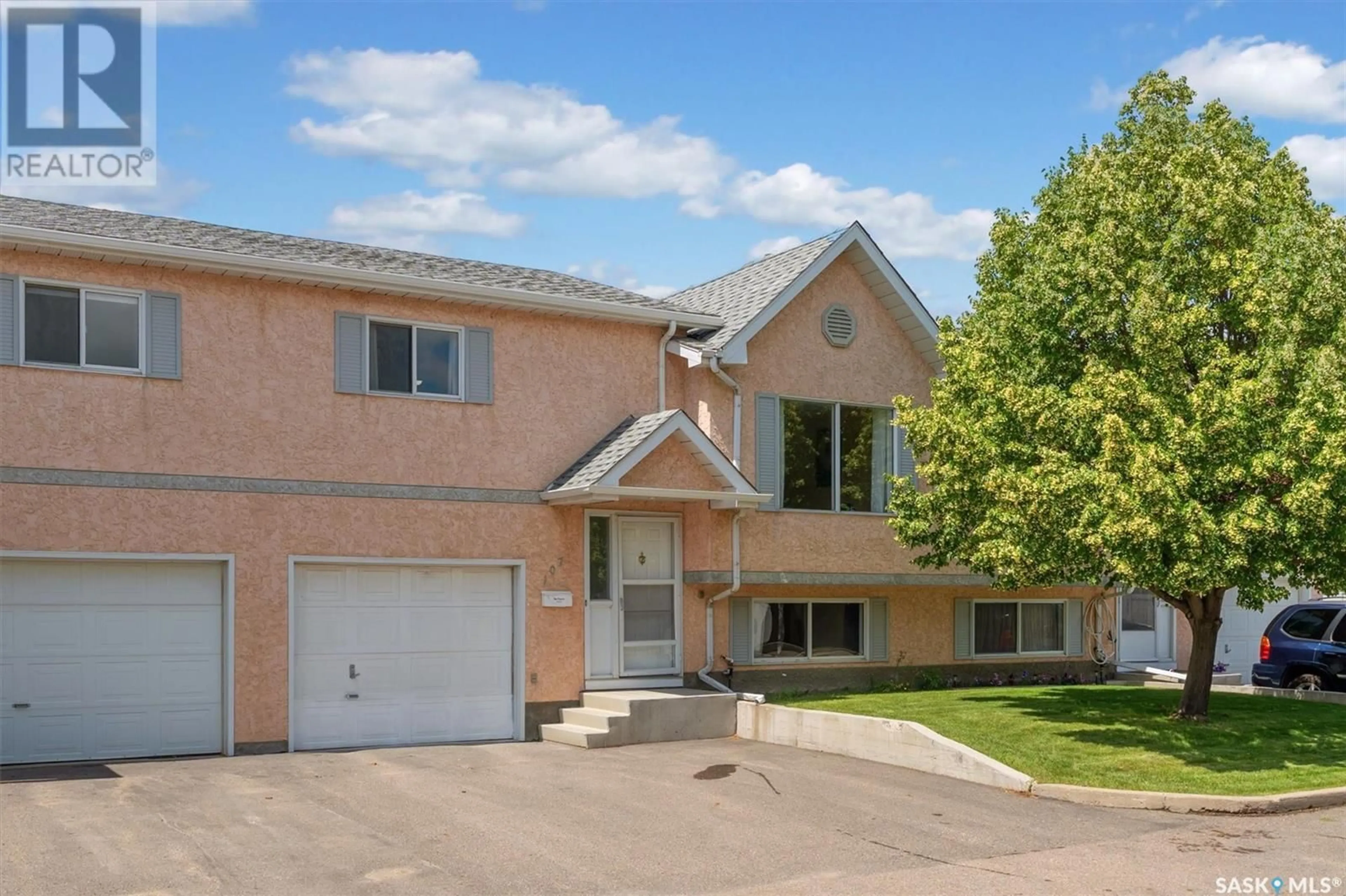 Home with vinyl exterior material, street for 107 - 610 PEREHUDOFF CRESCENT, Saskatoon Saskatchewan S7N4H5