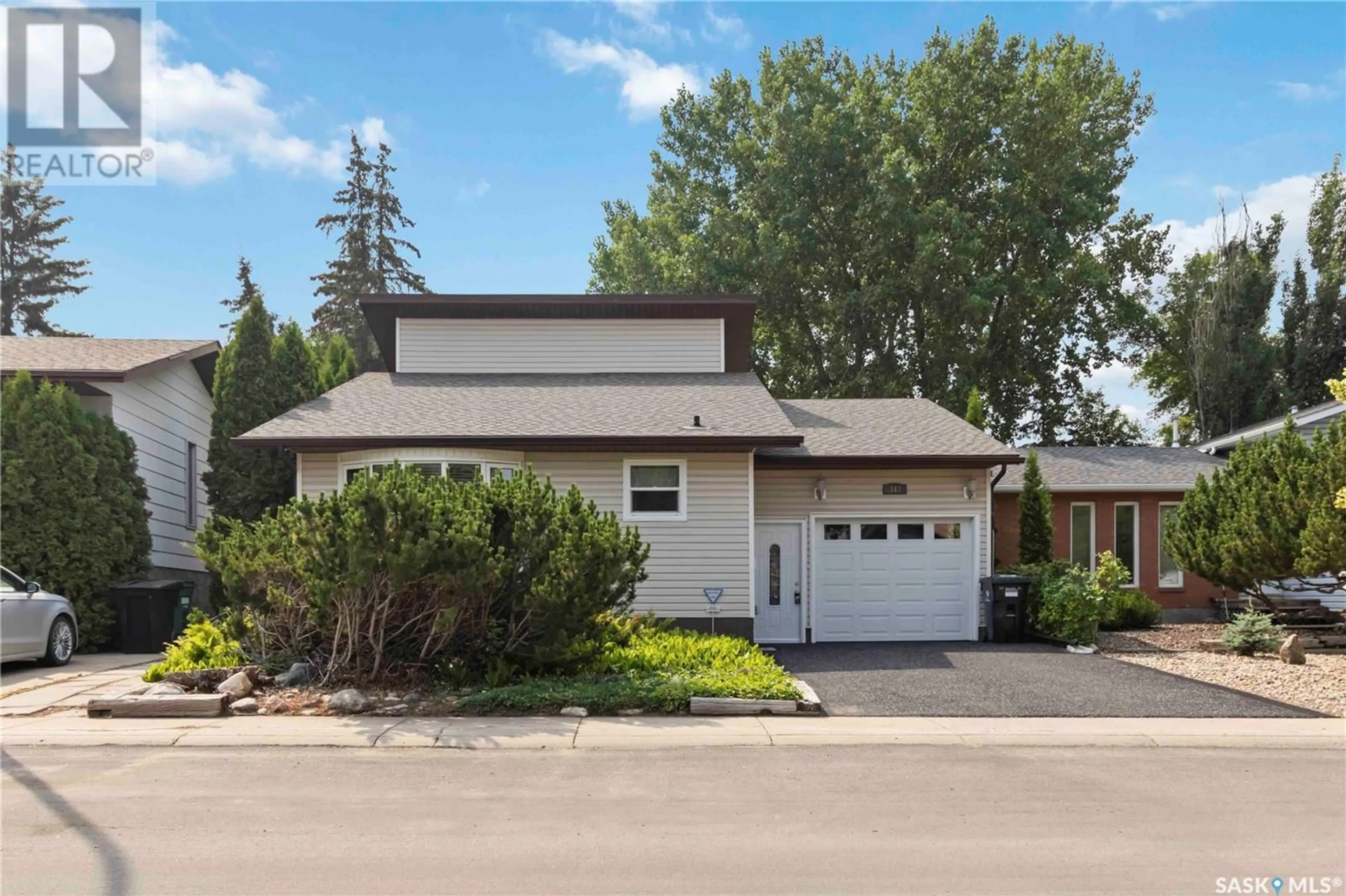 Home with vinyl exterior material, street for 347 DELARONDE ROAD, Saskatoon Saskatchewan S7J3Y5