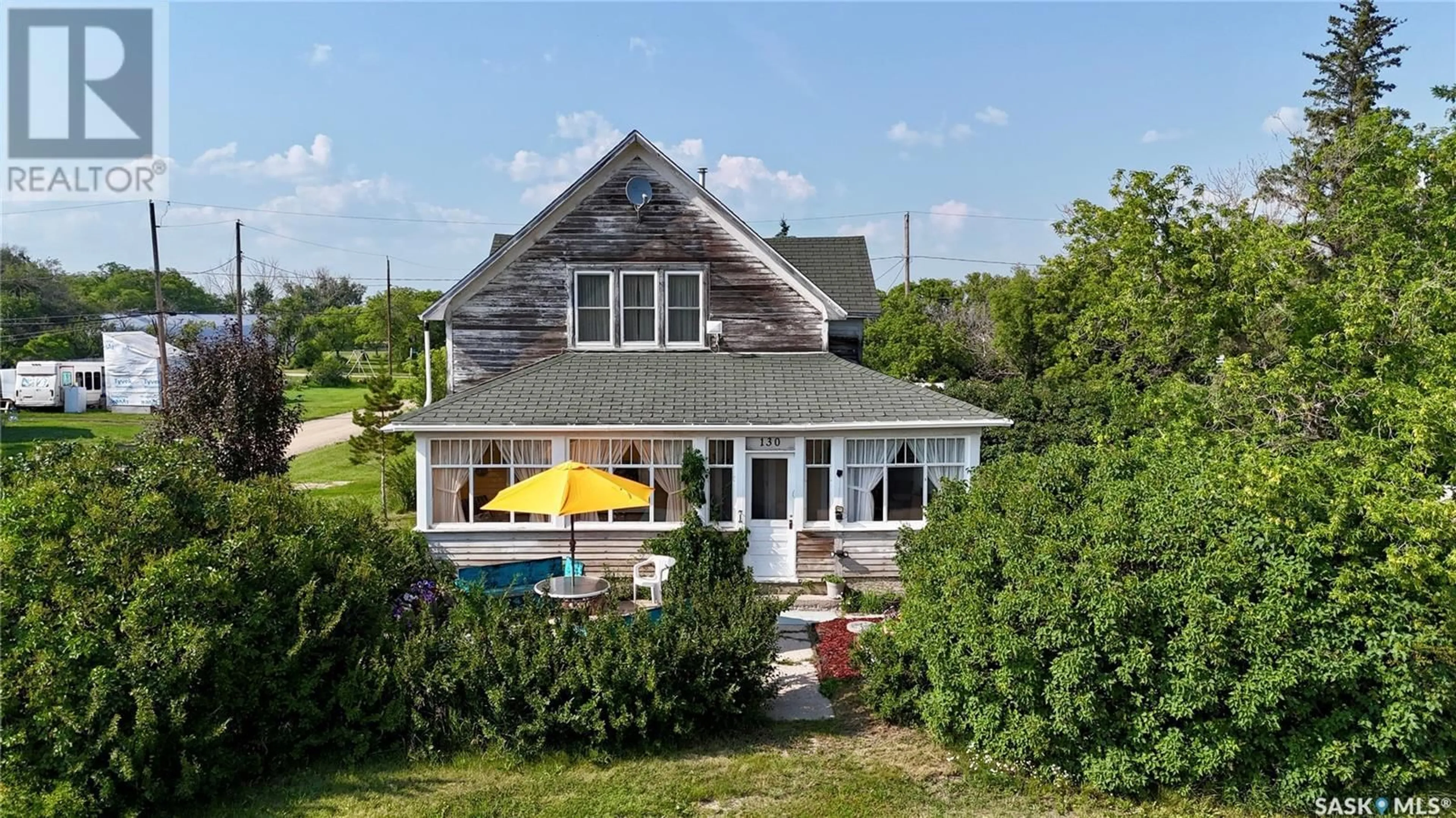 A pic from outside/outdoor area/front of a property/back of a property/a pic from drone, water/lake/river/ocean view for 130 WILLIAM STREET, Hawarden Saskatchewan S0H1Y0