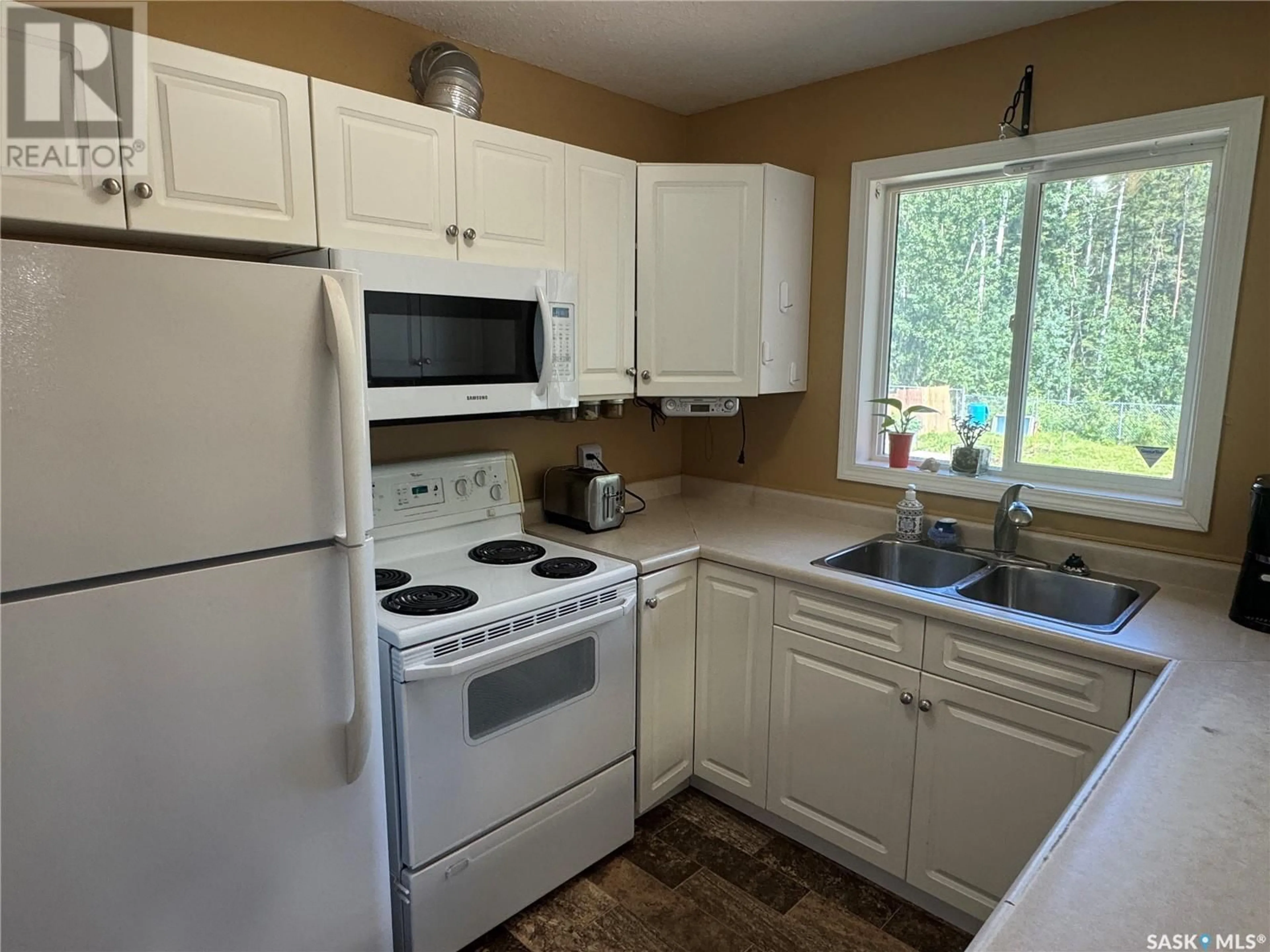 Standard kitchen, unknown for 217 VICKERS CRESCENT, Air Ronge Saskatchewan S0J3G0