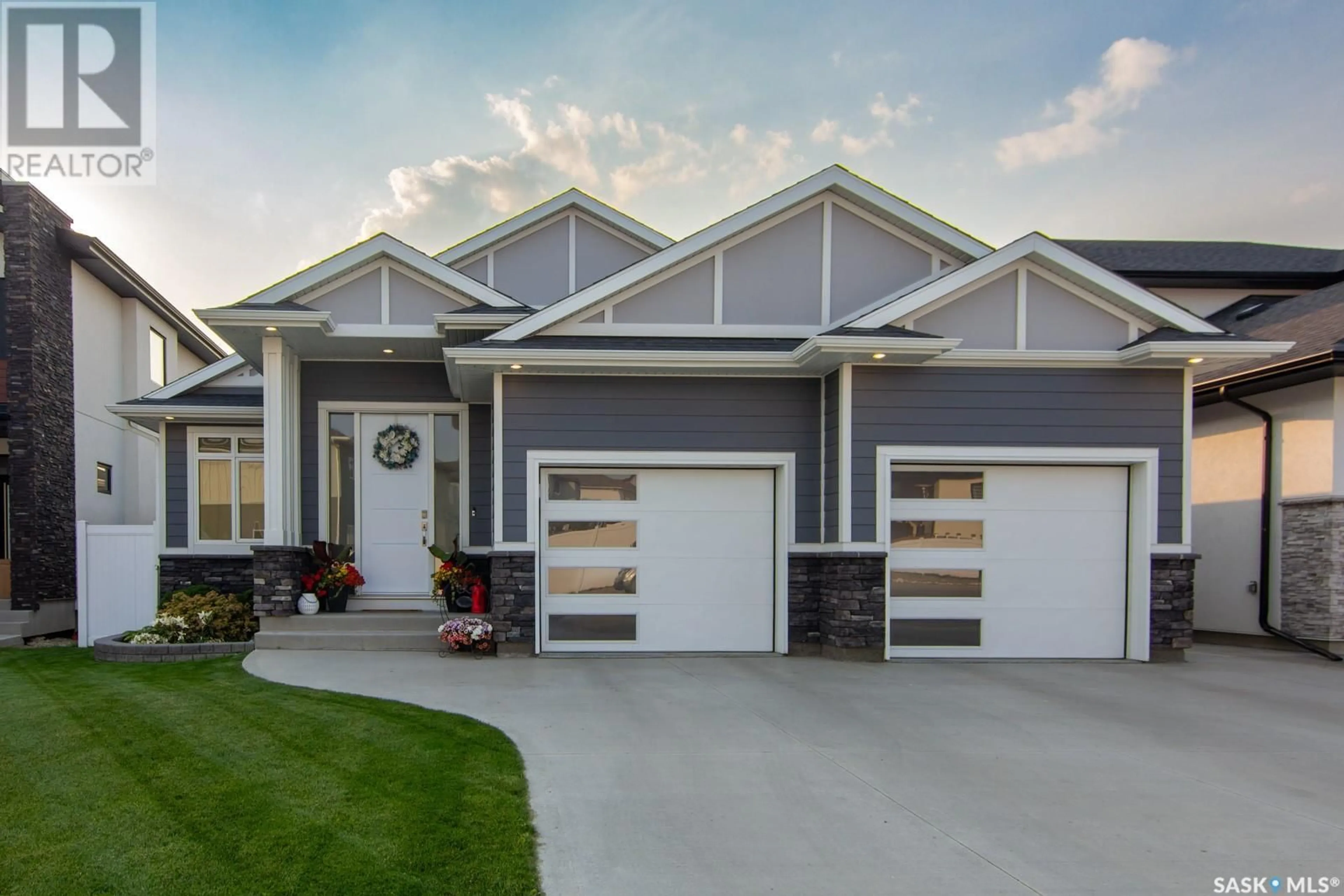 Home with vinyl exterior material, street for 423 SHARMA CRESCENT, Saskatoon Saskatchewan S7W1K7