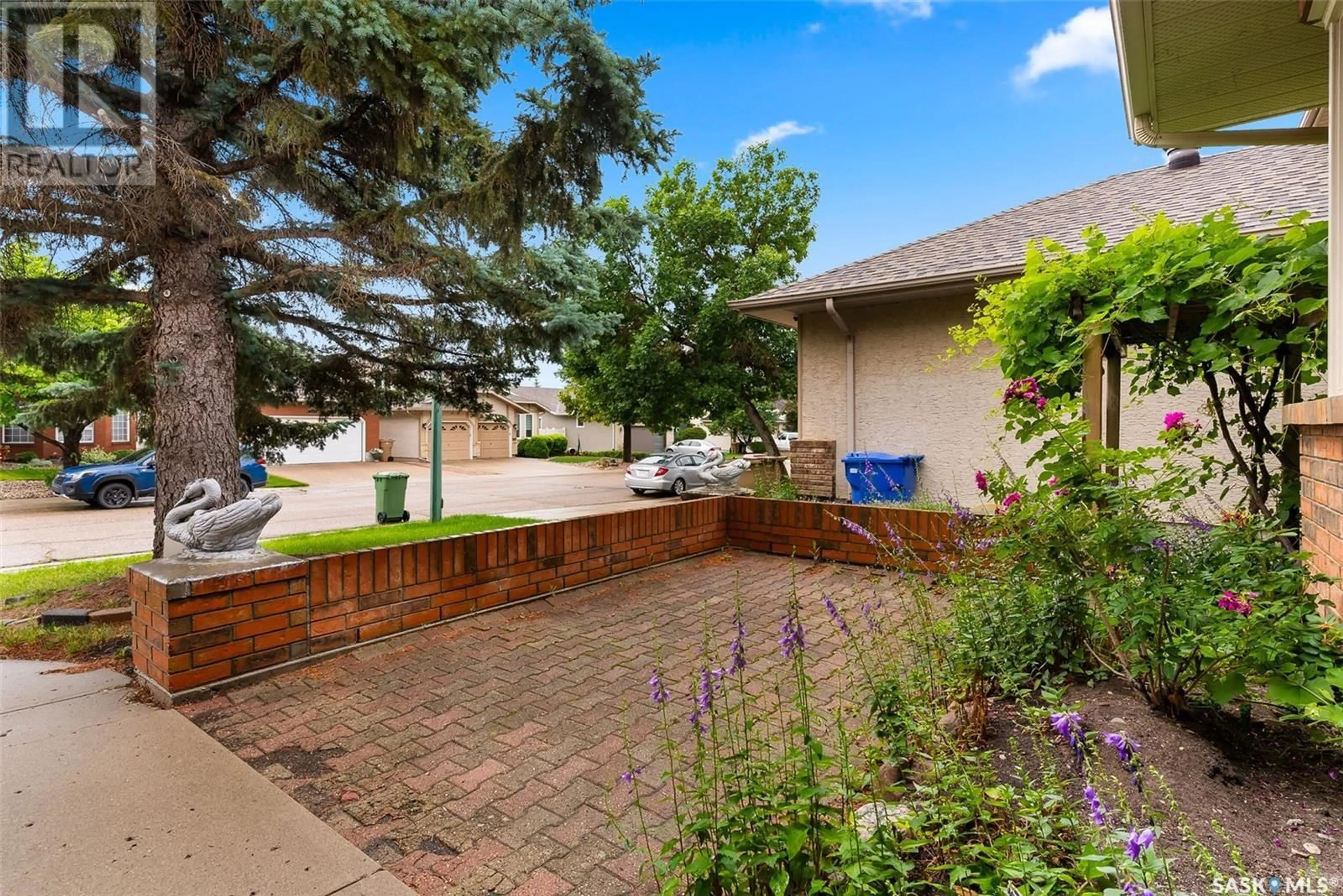 Patio, street for 238 ROGERS ROAD, Regina Saskatchewan S4S7C4