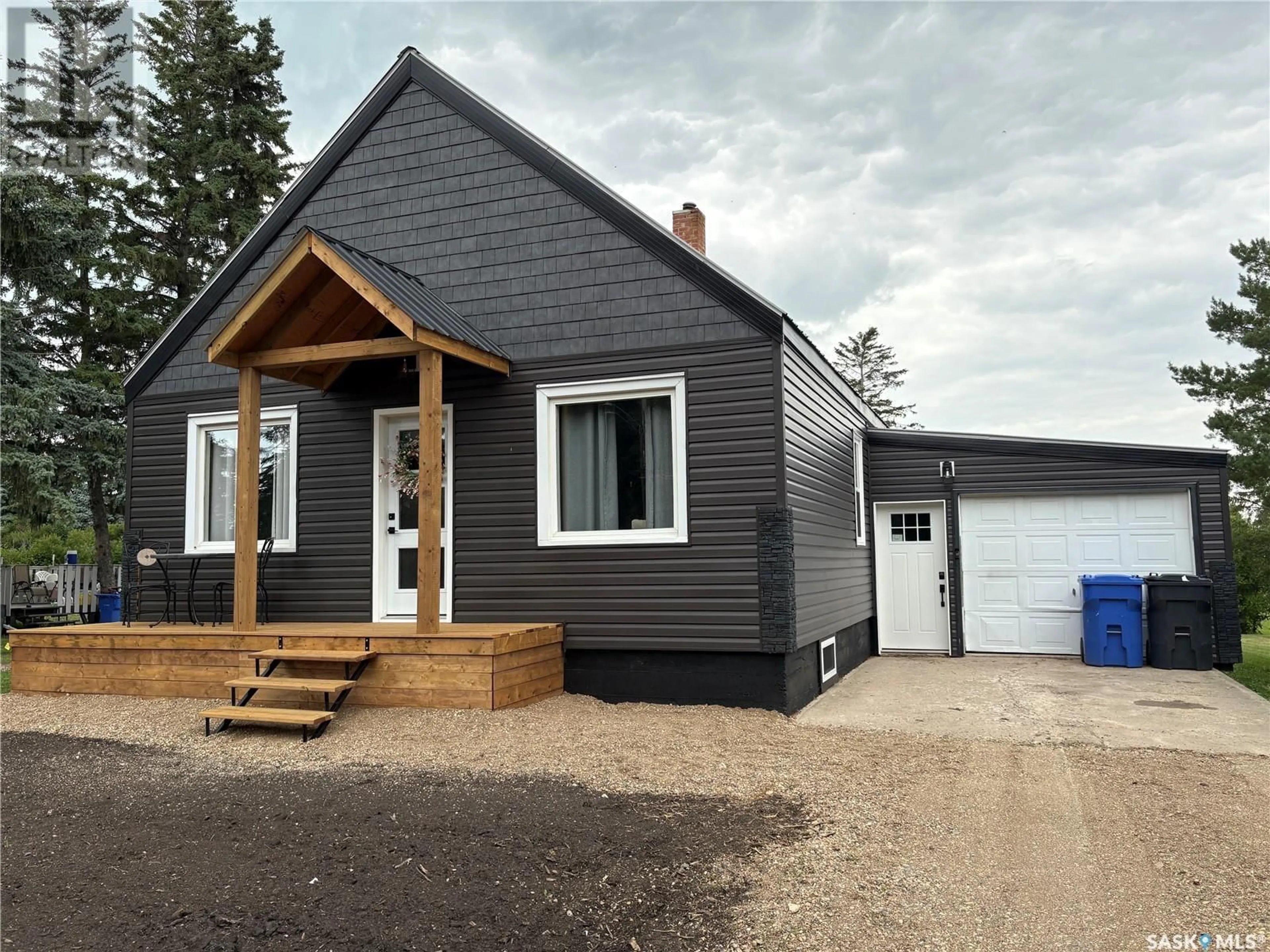 Home with vinyl exterior material, street for E - 212 RIEDEL AVENUE, Langenburg Saskatchewan S0A2A0