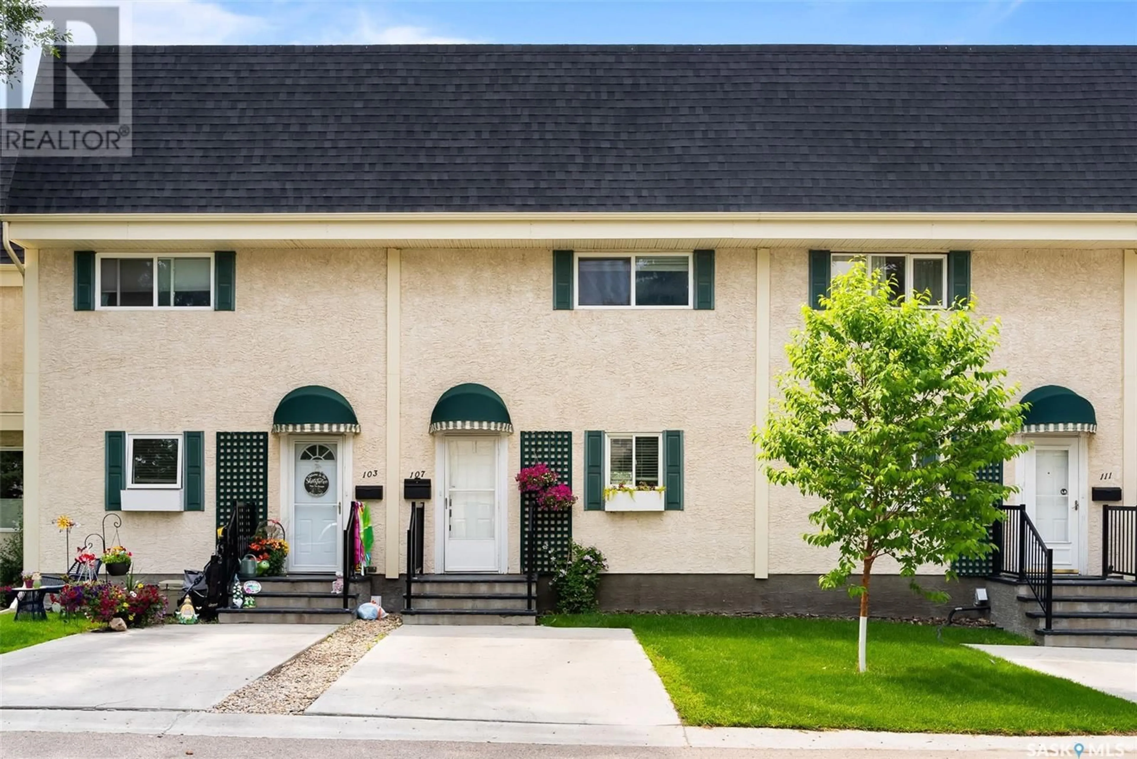 Home with vinyl exterior material, street for 107 KILLARNEY WAY, Regina Saskatchewan S4S6X8