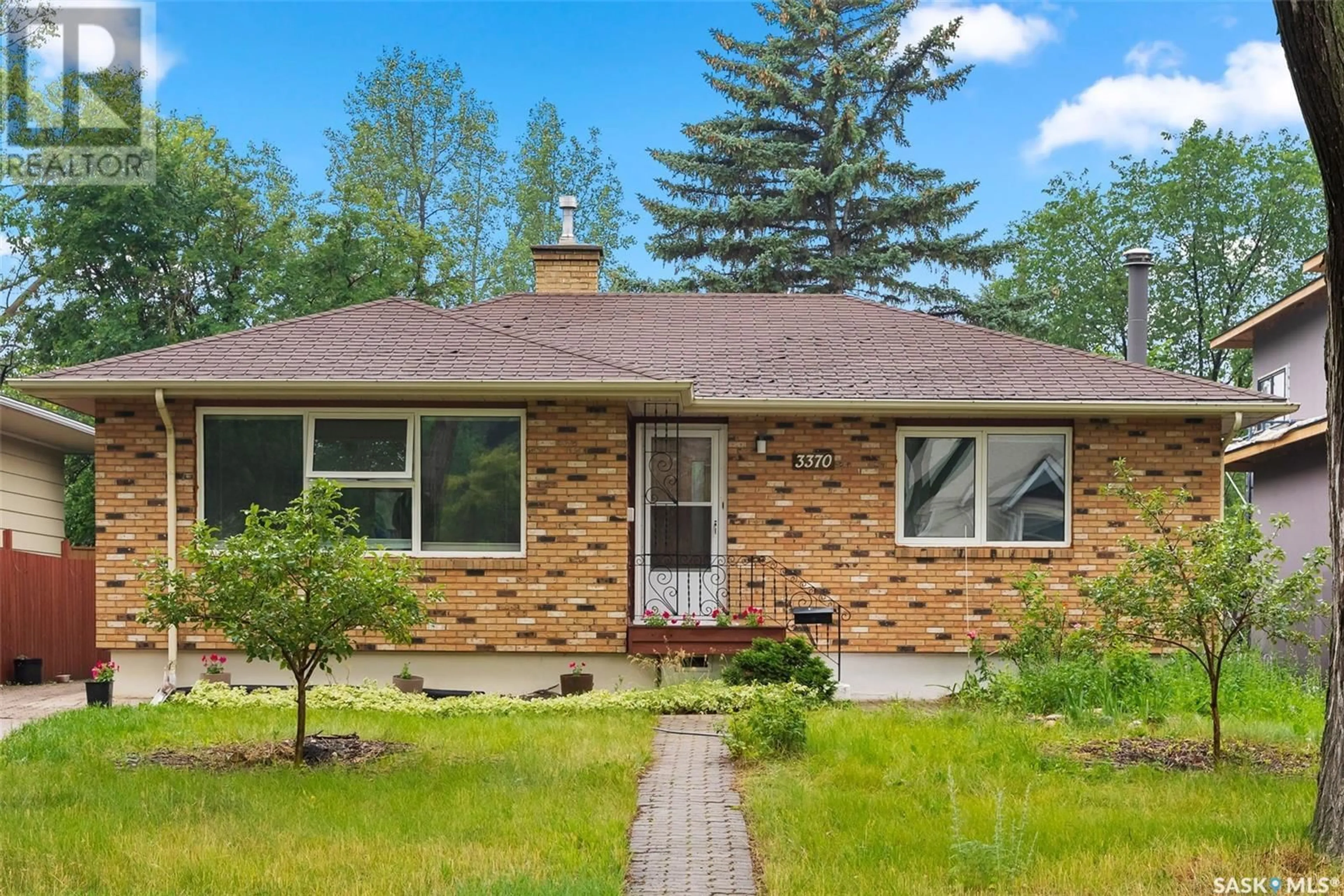 Home with brick exterior material, street for 3370 RAE STREET, Regina Saskatchewan S4S1S4